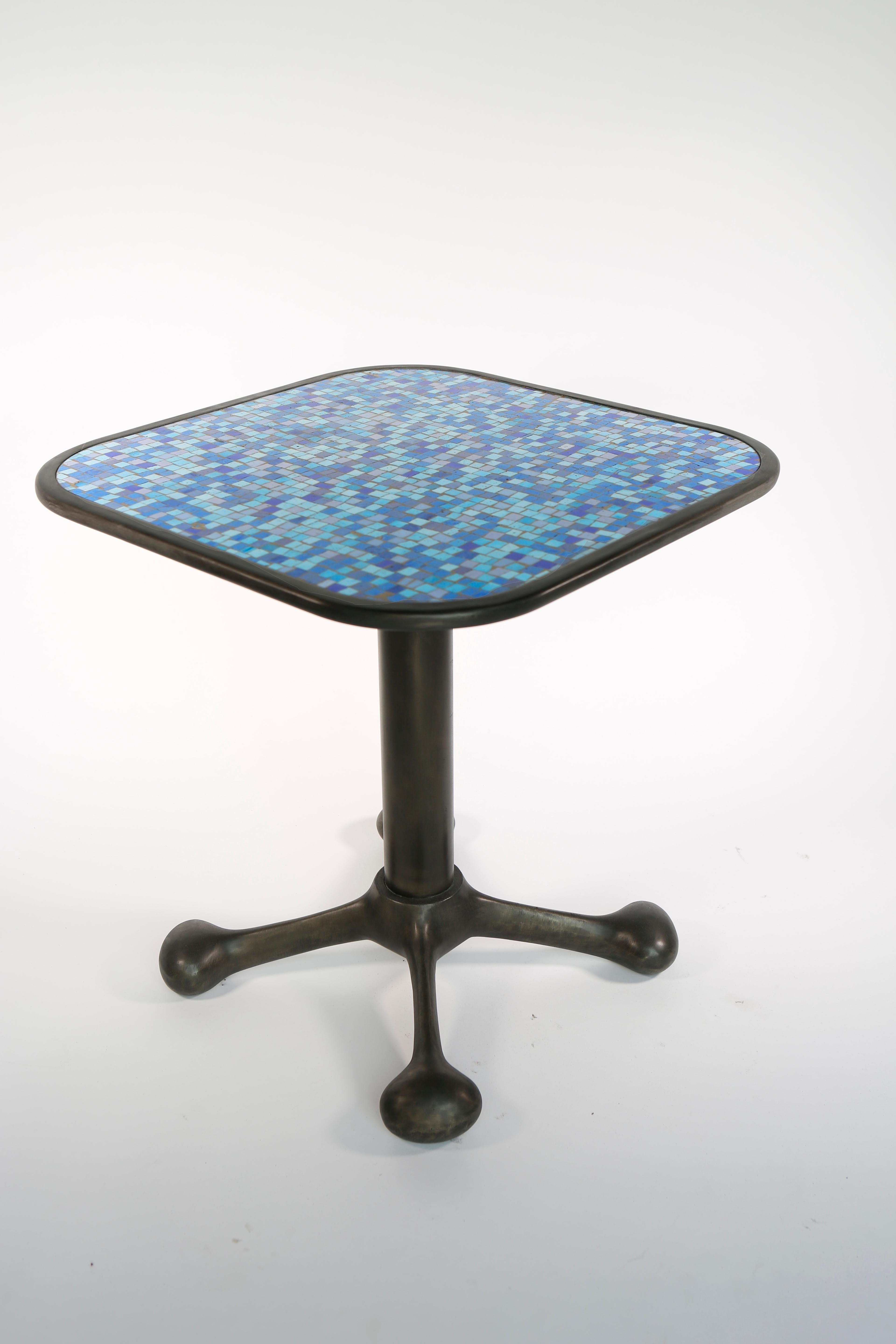 Jordan Mozer (b. 1958), I.C.E. side tables, polished glass mosaic, cast recycled aluminum, Chicago, 2001. Created for Bellagio Resort Hotel. Collection of the artist. Signed. 
Measurements: 22