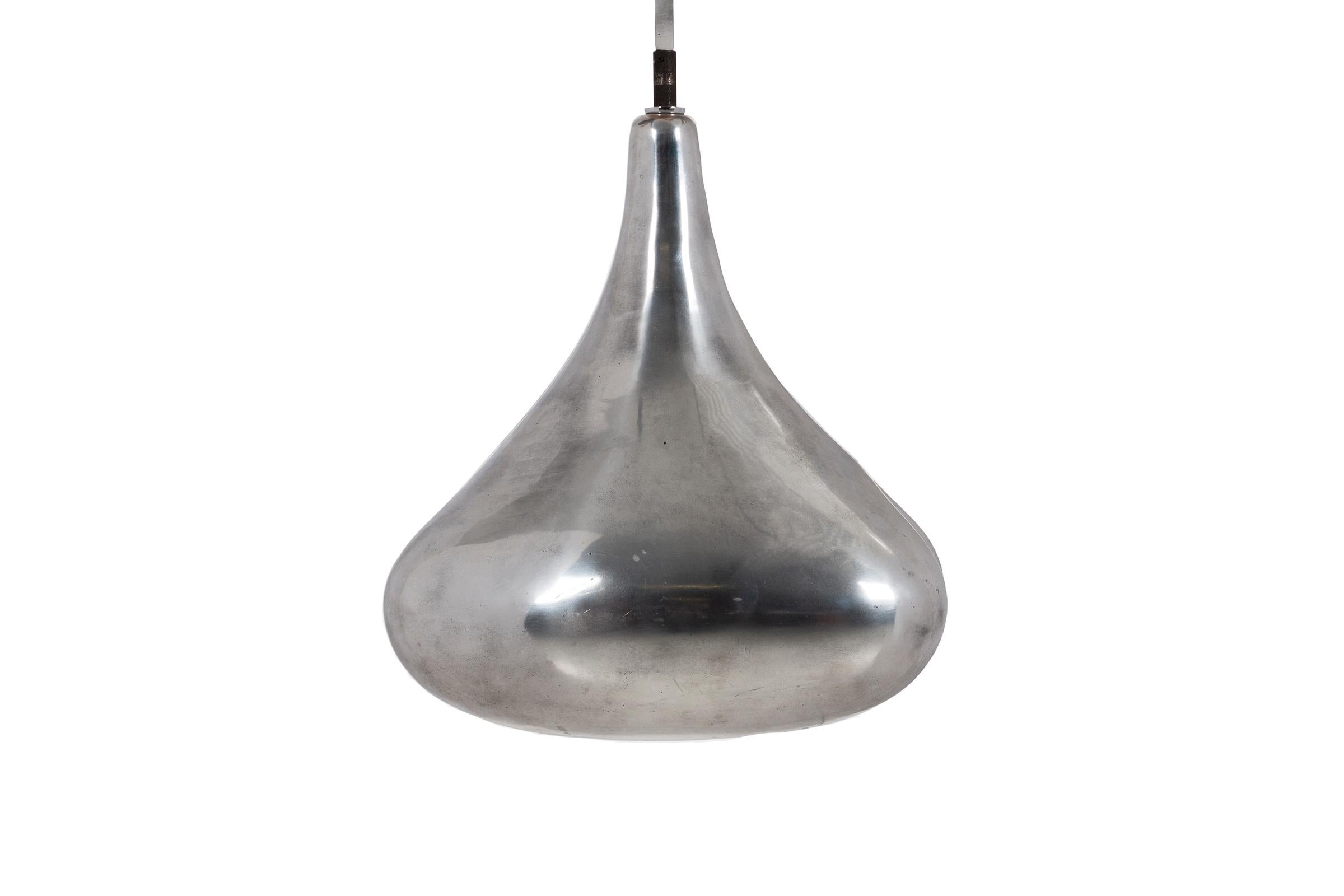 Chicago based acclaimed architect Jordan Mozer, known for couture interiors of restaurants and boutique hotels, these pendants from Bob San restaurant, Chicago.
Cast aluminum polished exterior with painted internal structure leaves a dramatic