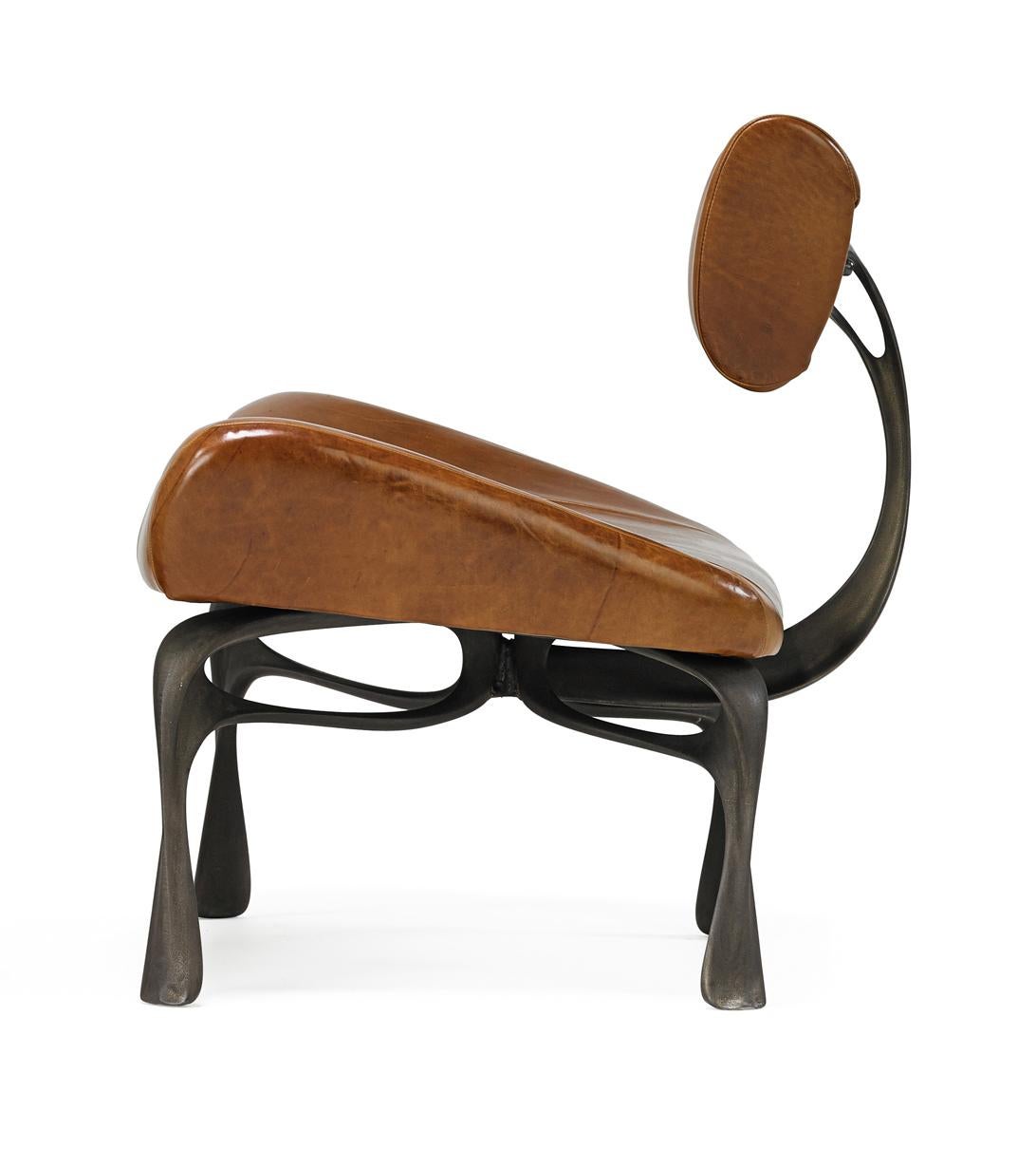 Jordan Mozer, Victory Lounge Chair, Leather and Cast, Recycled Magnesium-Aluminum Alloy with Hand Rubbed Patina, Made in Chicago, 2012/2016. A 2015 variation on the lounge chairs created for Victory at the Meadowlands in 2012-13. It is about 31”