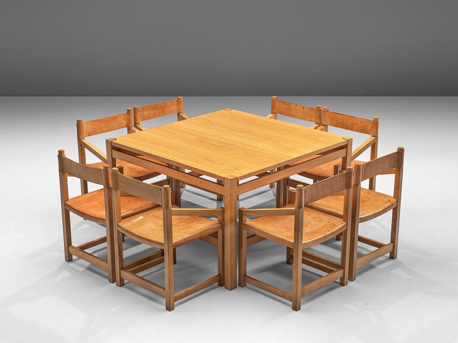 Casablanca Jordi Muntañola, dining set with table and 8 armchairs, pine and leather, Spain, 1979.

This set of eight armchairs from Spain is purist and modest. The chairs feature an architectural frame, of which the combination with diagonal