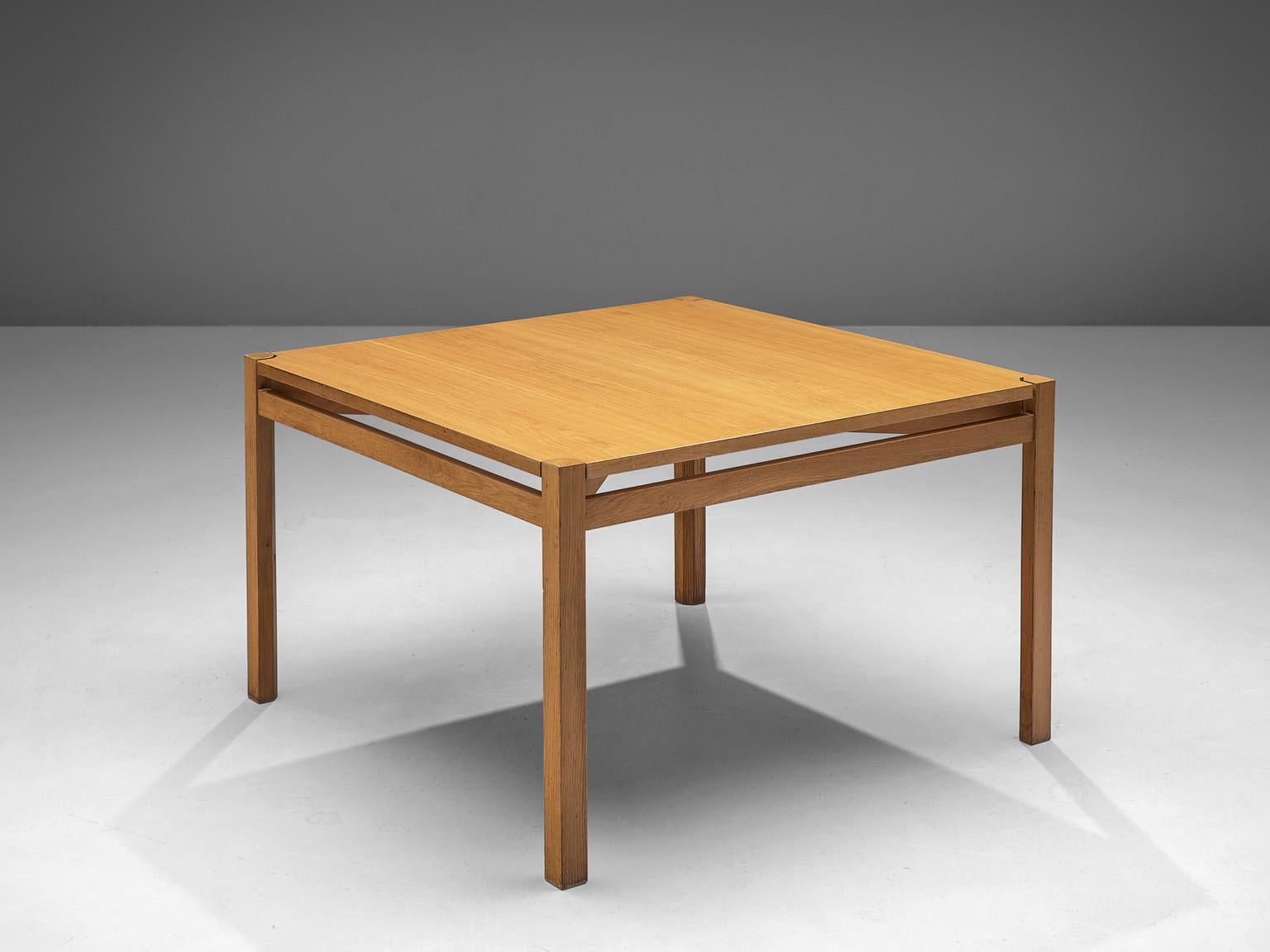 Jordi Casablanca Muntañola, dining table, oak, Spain, 1979. 

Catalan designer Jordi Casablanca Muntañola (1940-2001) designed this table in 1979. The dining table contains a square table top which stands on four angular legs that are connected with