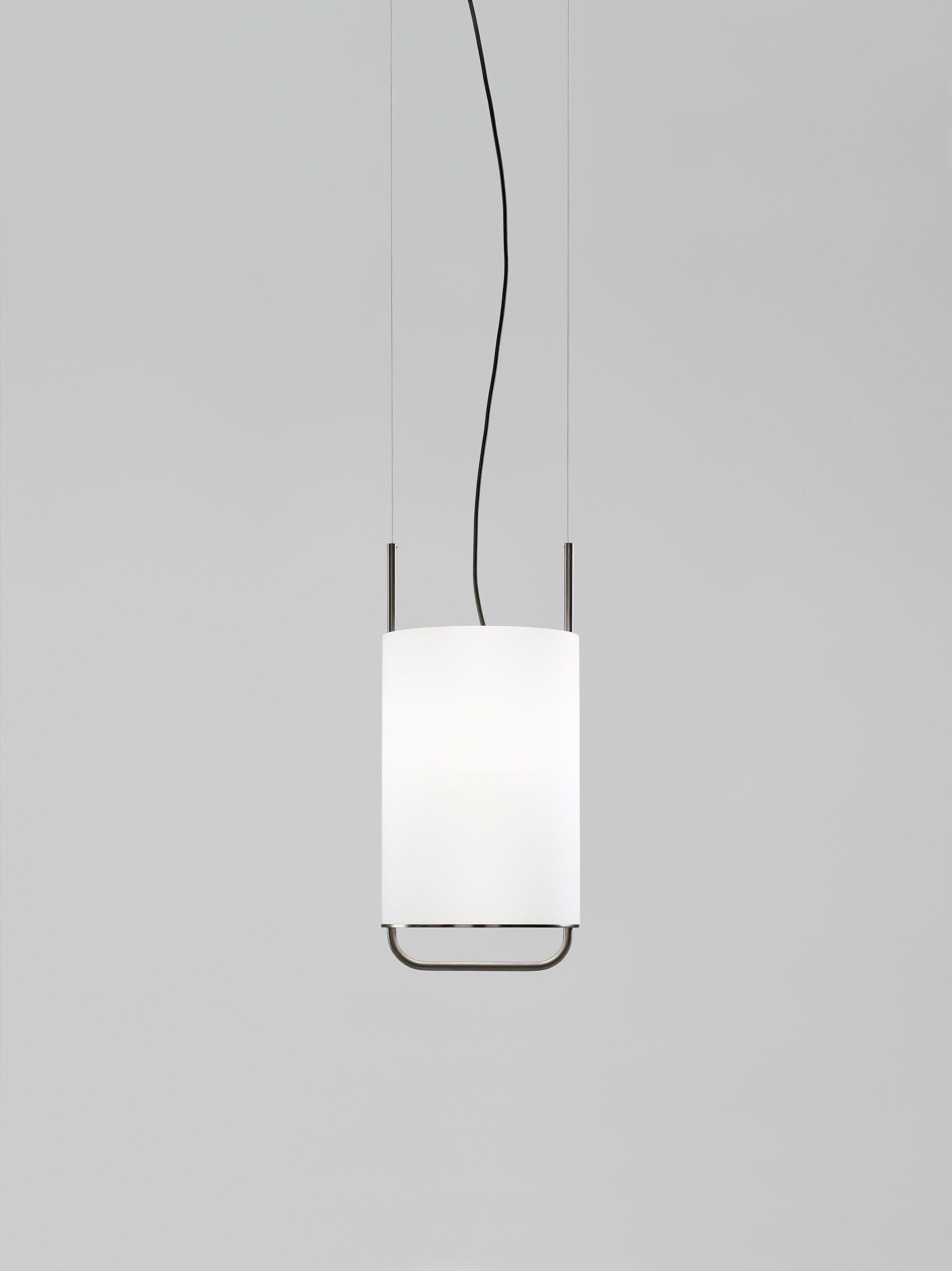 Alistair T
Suspension lamp, model Alistair T, designed by Jordi Vaciana in 2013.
Manufactured by Parachilna.
Structured in golden or graphite matt electroplated steel. Cylindrical diffuser in blown opal matt glass. 
Canopy in white matt lacquered