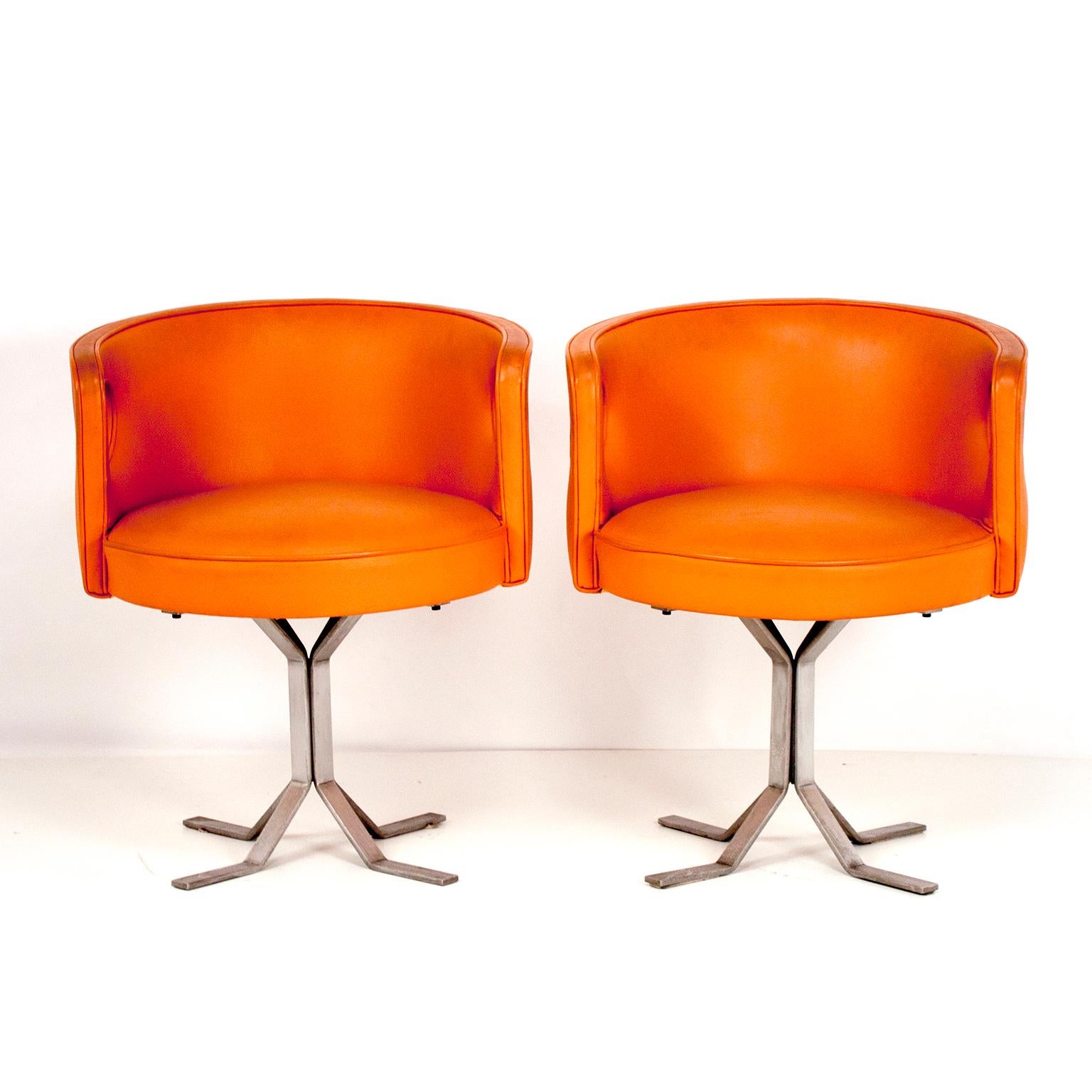 Pair of midcentury orange leather chairs, designed by Jordi Vilanova, 1970s.