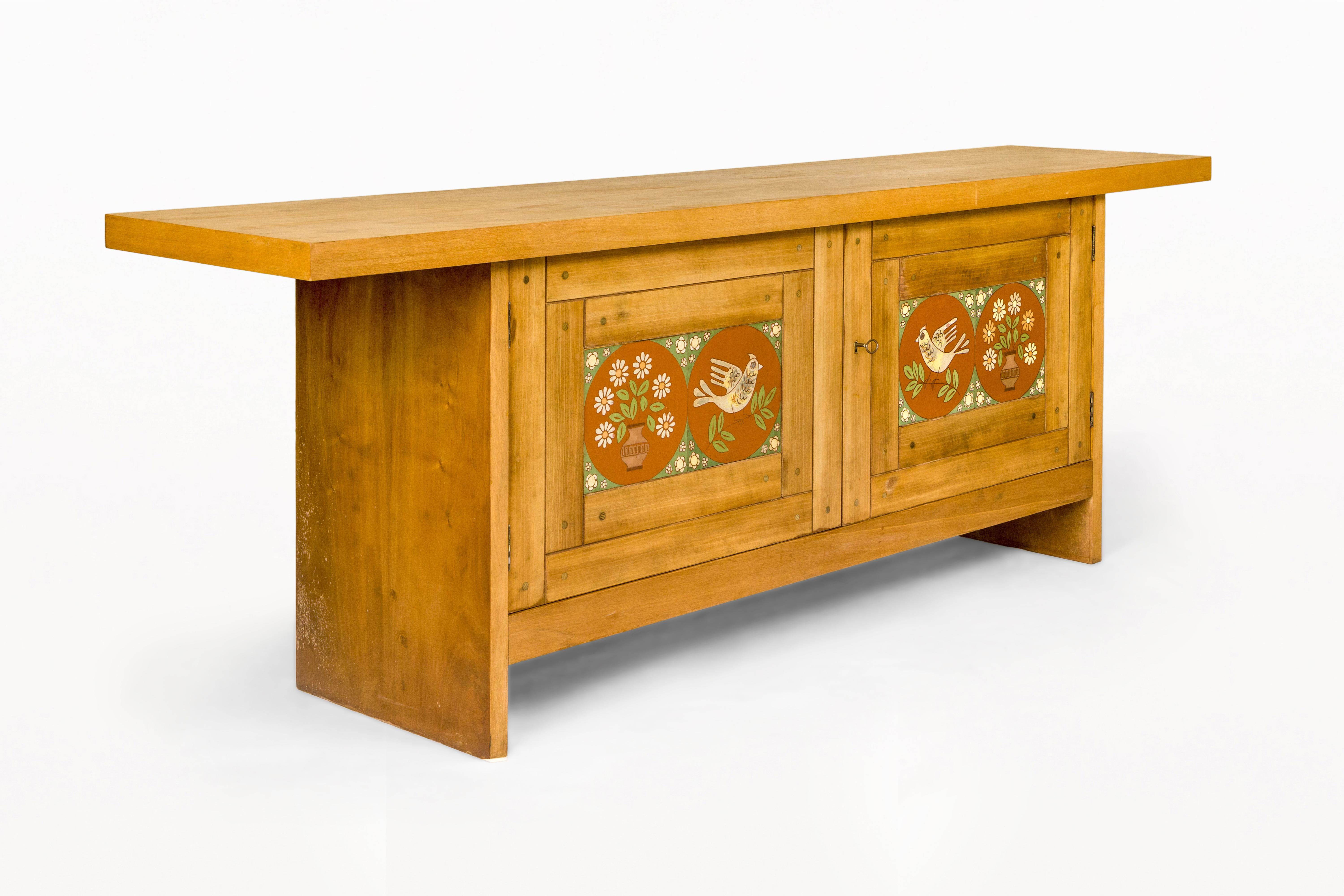 DESCRIPTION:  Jordi Vilanova Sideboard, circa 1960, Spain. Wooden Sideboard with Overhanging Top, and Double Doors with Glazed Ceramic Tiles.  A Strong Period Piece.  A Rare & Unique Vilanova furniture.

CONDITION: Good condition. Wear consistent