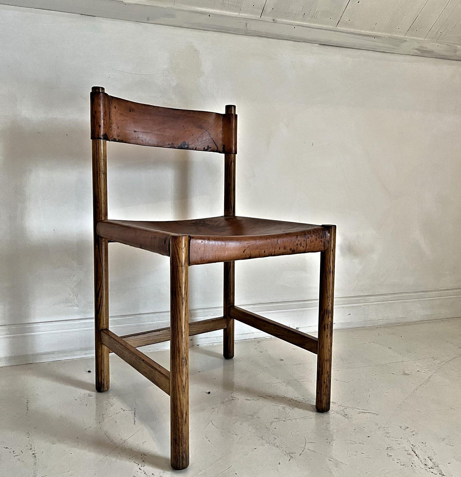 A honest laether and softwood chair by Spanish mid-century designer Jordi Villanova. Nice patina overall. Sturdy and ready to use.