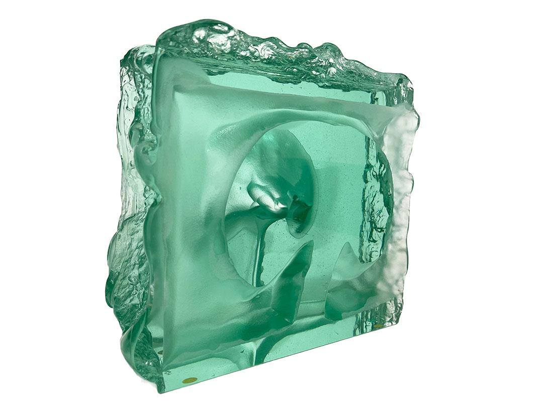 Jörg F. Zimmermann German, dimensional glass sculpture.

Jörg Zimmermann (1940 -) is a German glass artist of organic blown glass sculptures. A square glass block sculpture with a dimensional organic scene in the glass. It is smooth on one side
