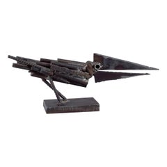Jörg Jeschke, Austrian sculptor. Metal sculpture of a bird on a pedestal.