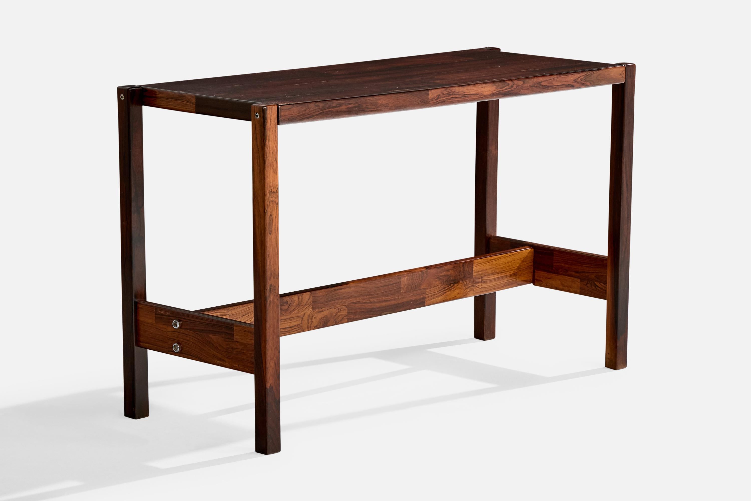 A rosewood console table designed by Jorge Zalszupin and produced by L'Atelier, Brazil, 1975.

Overall Dimensions (inches): 27.5