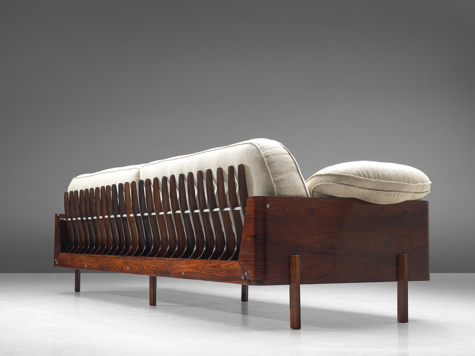 Lineart Moveis e Decoracoes, four-seat sofa, Brazilian rosewood, metal and fabric, Brazil, 1960s

This large four-seat sofa was designed by architect and designer Jorge Zalszupin. Very well crafted in Brazilian jacaranda and off-white upholstery.