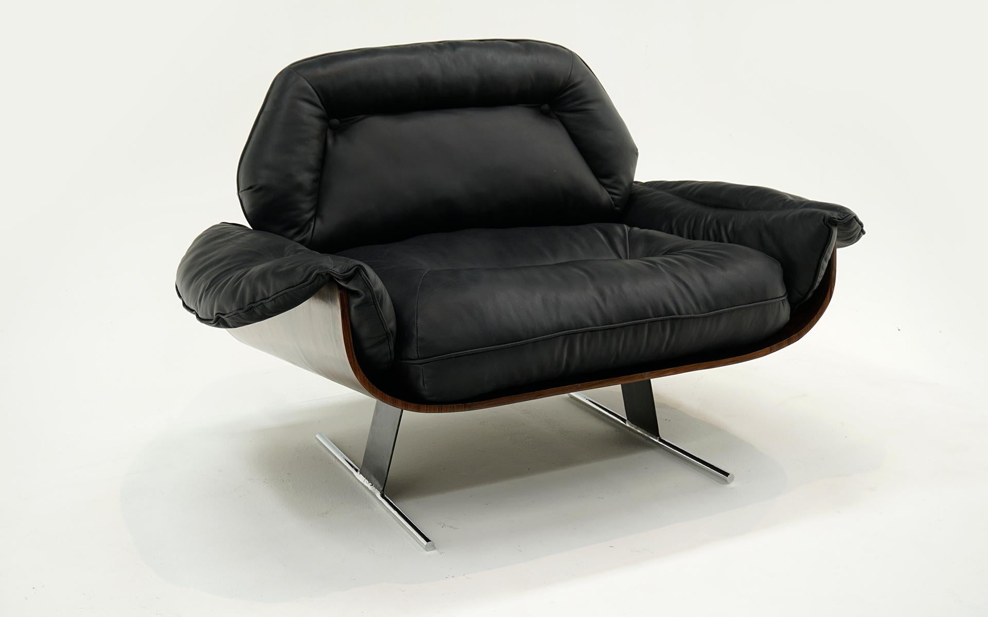 Rare Jorge Zalszupin Presidential Lounge Chair.  Brazilian Rosewood frame with expertly reupholstered black leather cushions.  No holes, tears or repairs.  The Brazilian rosewood is beautiful with very few signs of wear..  This is a great example of