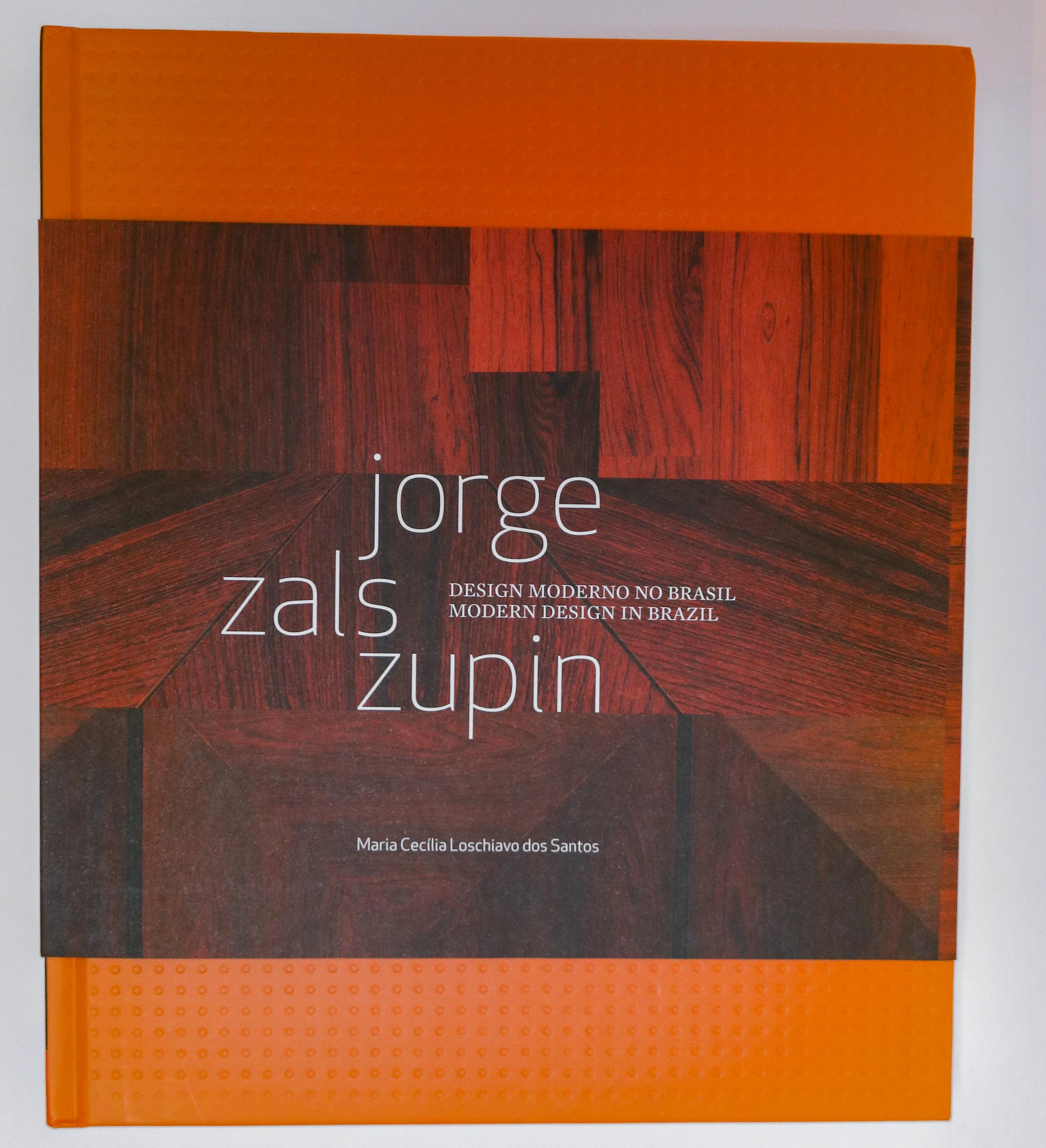 Jorge Zalszupin Modern Design in Brazil book by Maria Cecilia Loschiavo dos Santos published in Brazil in 2014 in Portuguese and English. Never published in the US. Covers all of Zalszupin's furniture designs. New, never used, still in plastic.