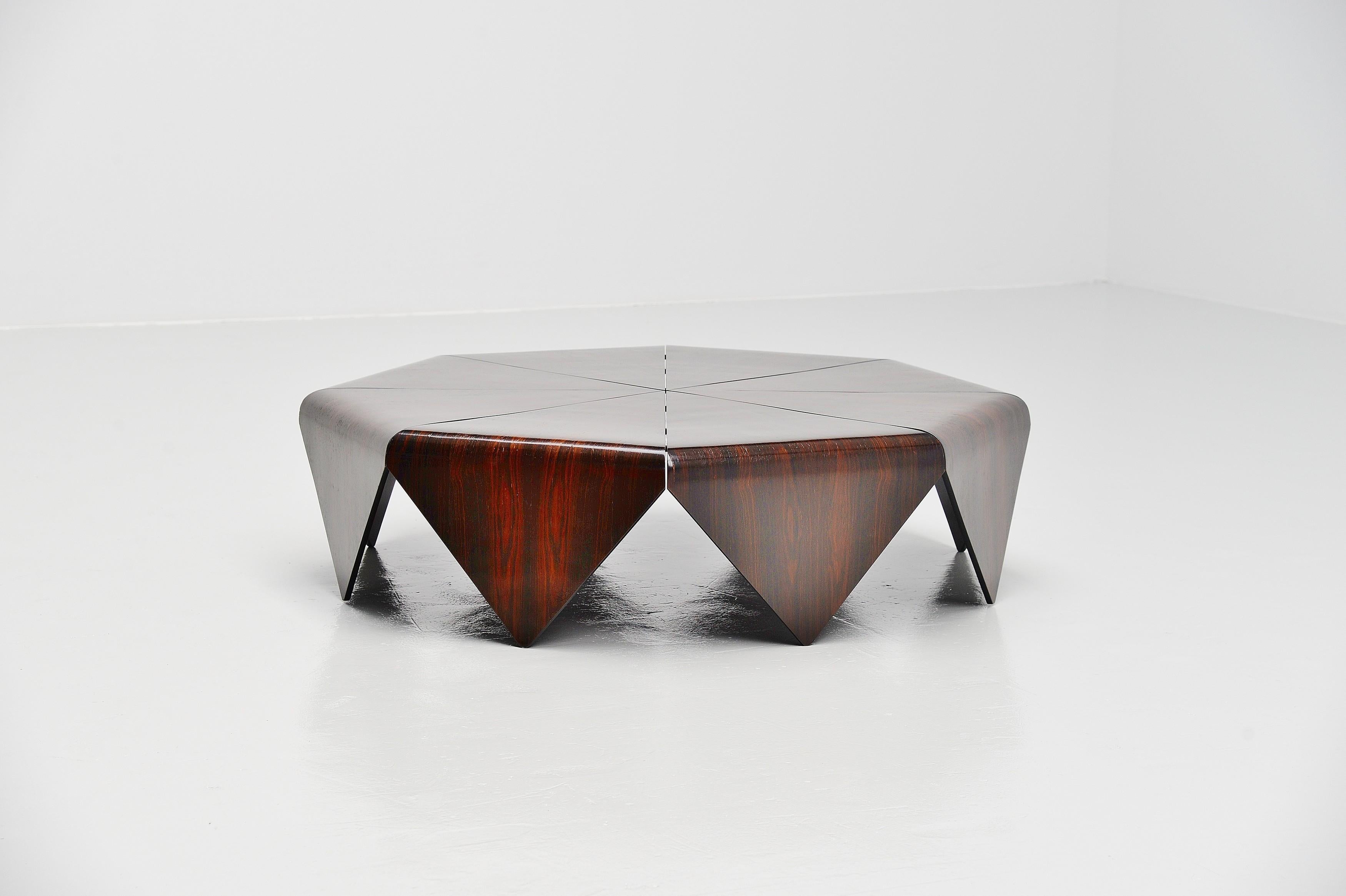 Beautiful and rare so called 'Petalas' coffee table designed by recently passed away designer Jorge Zalszupin, manufactured in his own company L'Atelier, Brazil 1959. The Petalas table was inspirede by a folded paper structure of origami. This table