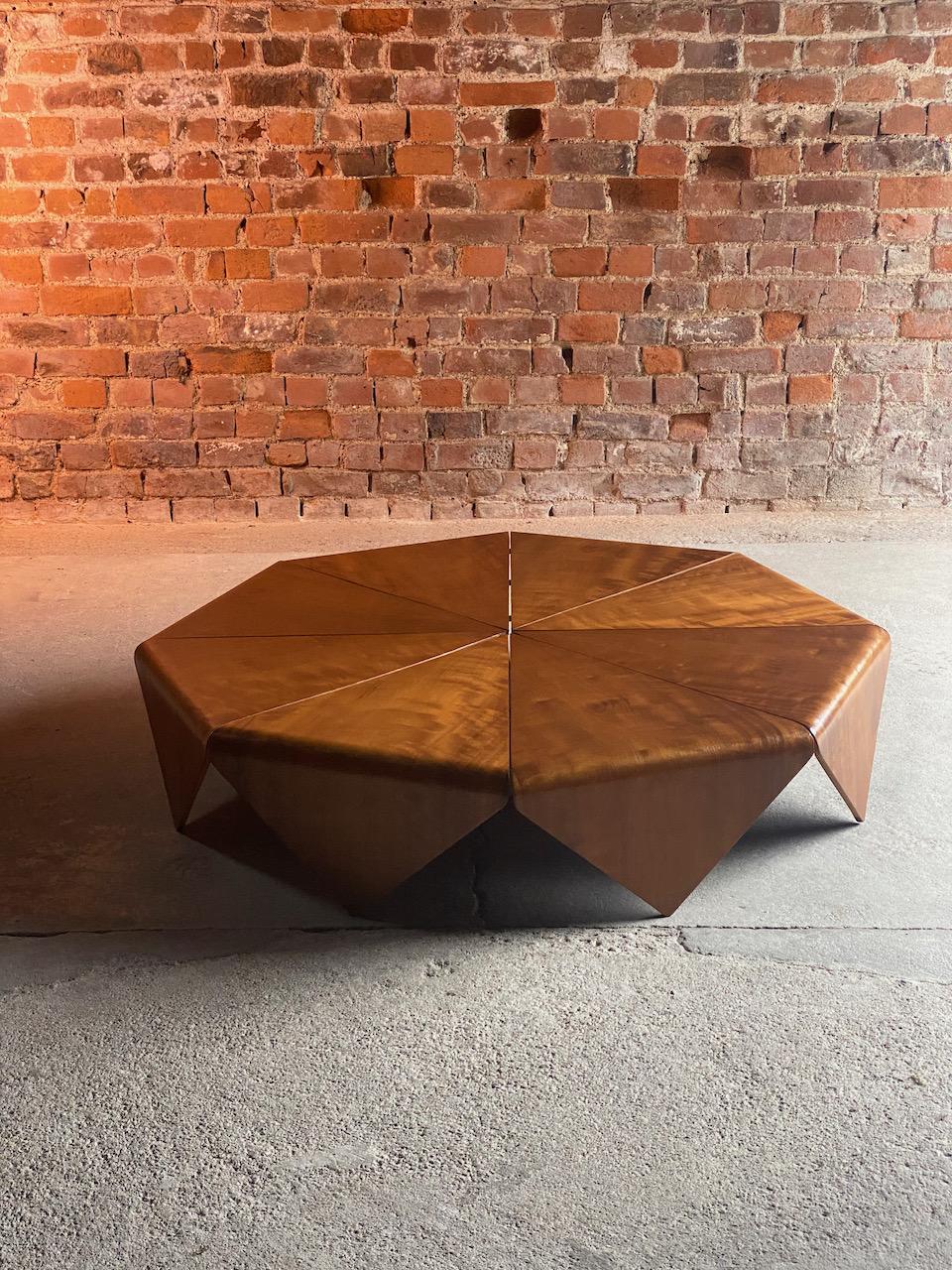 Jorge Zalszupin Petalas Imbuia coffee table by L' Atelier, circa 1960

Stunning Jorge Zalszupin ‘Petalas' Brazilian Walnut Imbuia coffee table manufactured by L' Atelier circa 1960, the octagonal Petalas coffee table was inspired by the folded