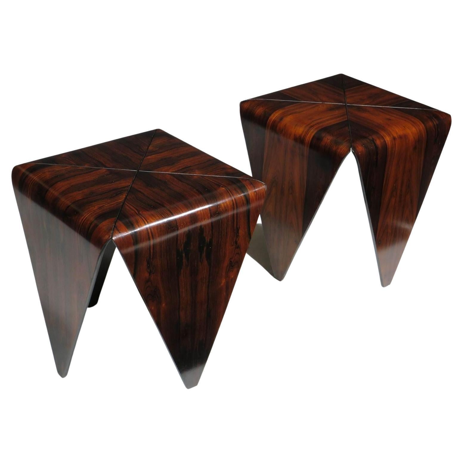 Pair of mid century rosewood side tables designed by Jorge Zalszupin manufactured by L' Atelier, Sao Paulo Brazil. The tables are uniquely crafted of steamed rosewood in an origami shape of four folded petals with richly figured rosewood grain,