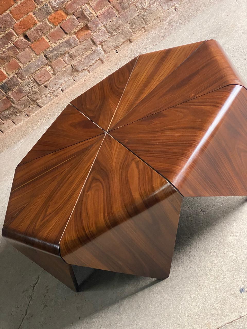 Jorge Zalszupin Petals Pau Ferro coffee table by L' Atelier circa 1960

Magnificent mid century Jorge Zalszupin ‘Petalas' Brazilian Pau Ferro (Iron Wood) coffee table manufactured by L' Atelier circa 1960, the octagonal Petalas coffee table was