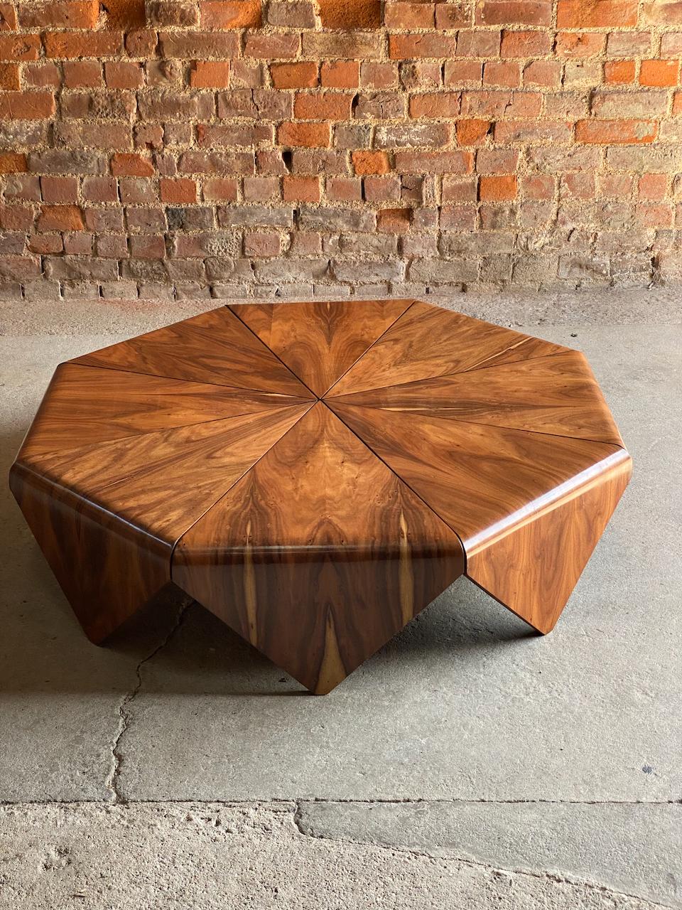 Jorge Zalszupin Petals Rosewood Coffee Table by L' Atelier circa 1965.

Magnificent mid century Jorge Zalszupin ‘Petals' Jacaranda Rosewood coffee table manufactured by L' Atelier circa 1965, the octagonal Petals coffee table was inspired by the
