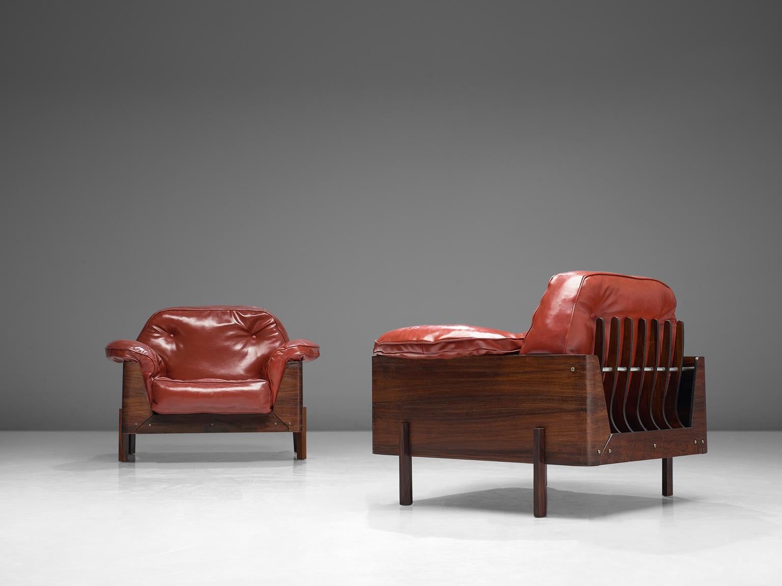 Lineart Moveis e Decoracoes, Pair of lounge chairs, in rosewood, metal and leatherette, Brazil 1960s. 

Highly rare pair of lounge chairs with bended rosewood frame and extraordinary skeleton back. Four hexagonal shaped legs of solid rosewood