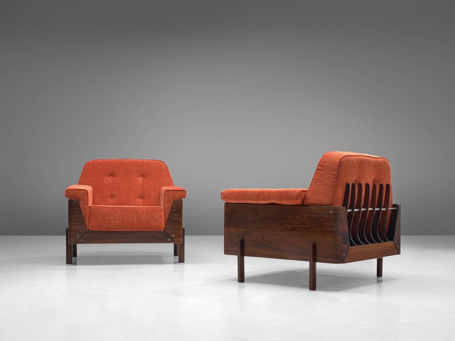 Lineart Moveis e Decoracoes, pair of lounge chairs, rosewood, metal and fabric, Brazil, 1960s. 

Highly rare pair of lounge chairs with bended rosewood frame and extraordinary skeleton back. Four hexagonal shaped legs of solid rosewood support the