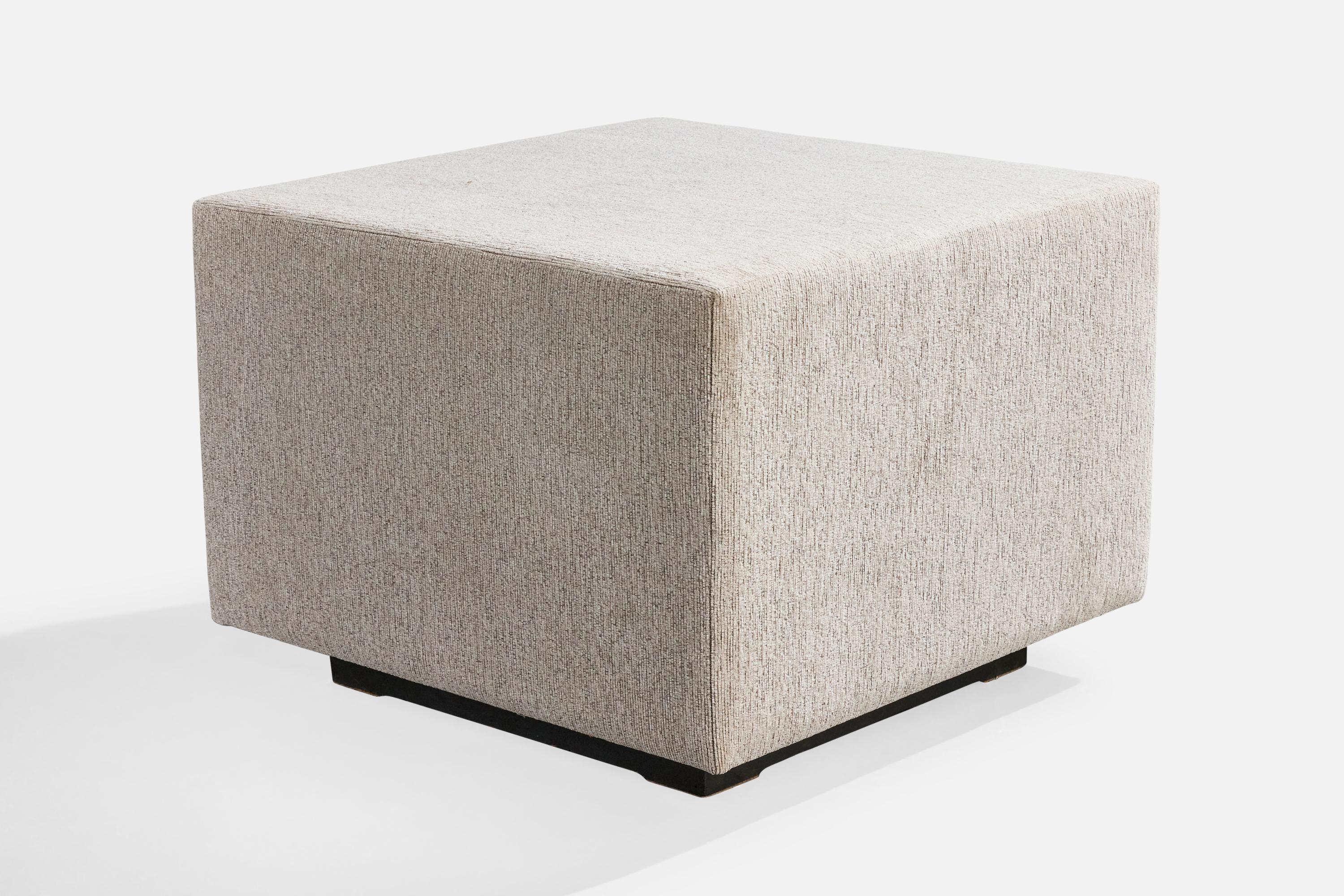 A light grey fabric and black vinyl covered iron 