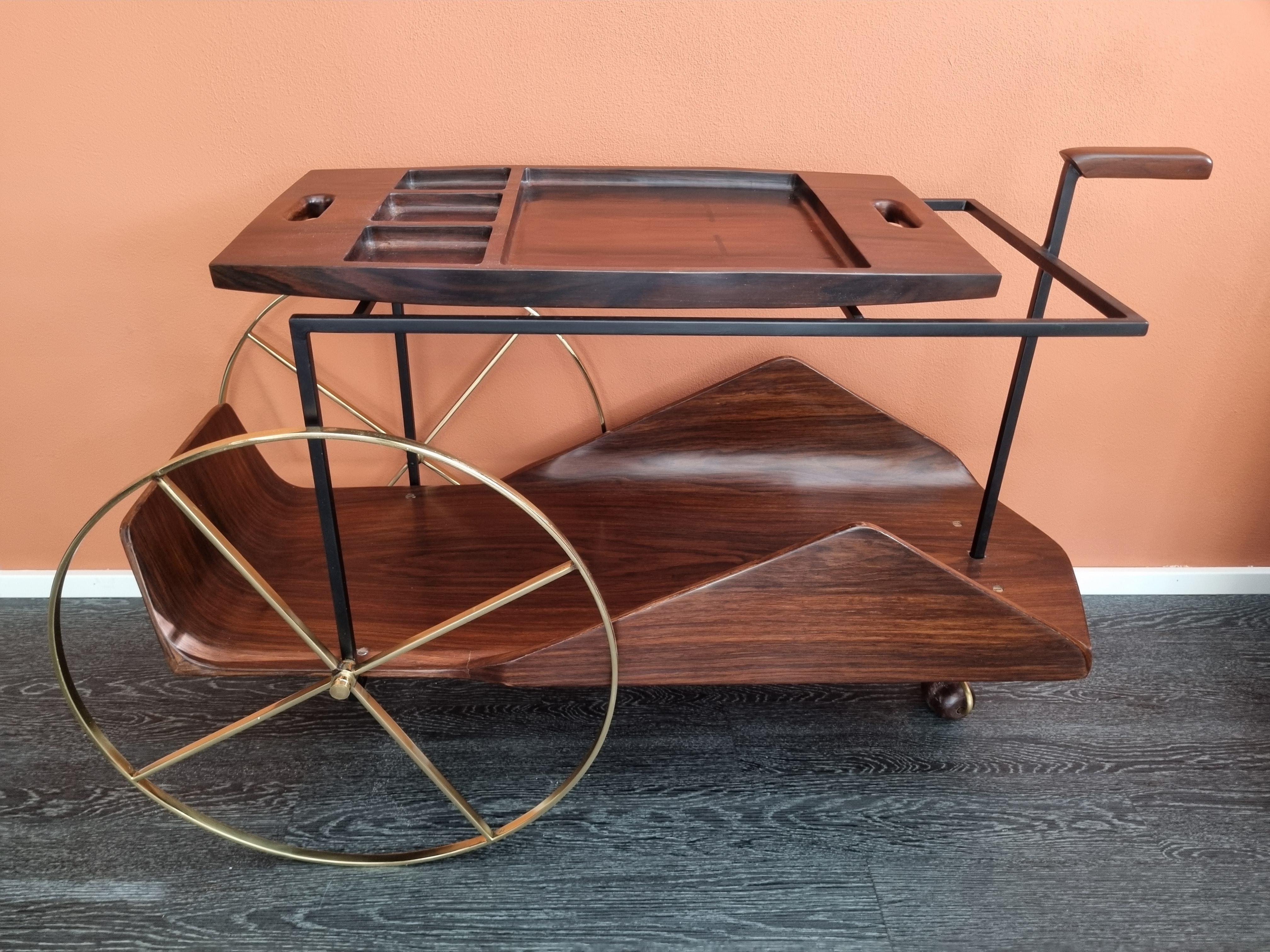 Designed by renowned Brazilian architect and designer Jorge Zalszupin, the JZ Tea Trolley, also known as the 