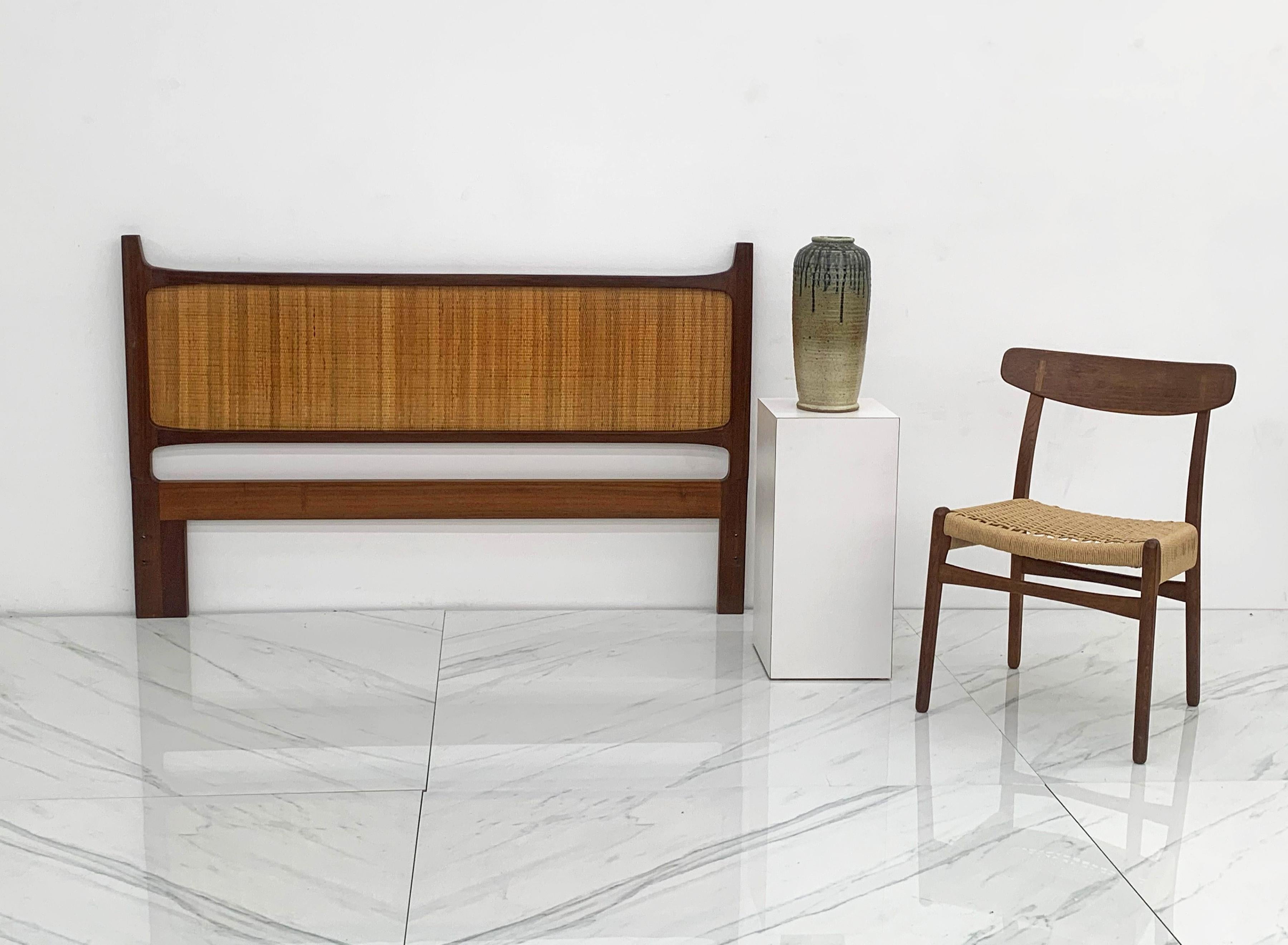 An exceptional and extremely rare 1950's Mid-Century Modern Queen sized heaboard designed by Jorgen Clausen for Brande Møbelfabrik, Denmark c. 1950. Often misattributed to Edmond Spence, this gorgeous headboard was fabricated from walnut with