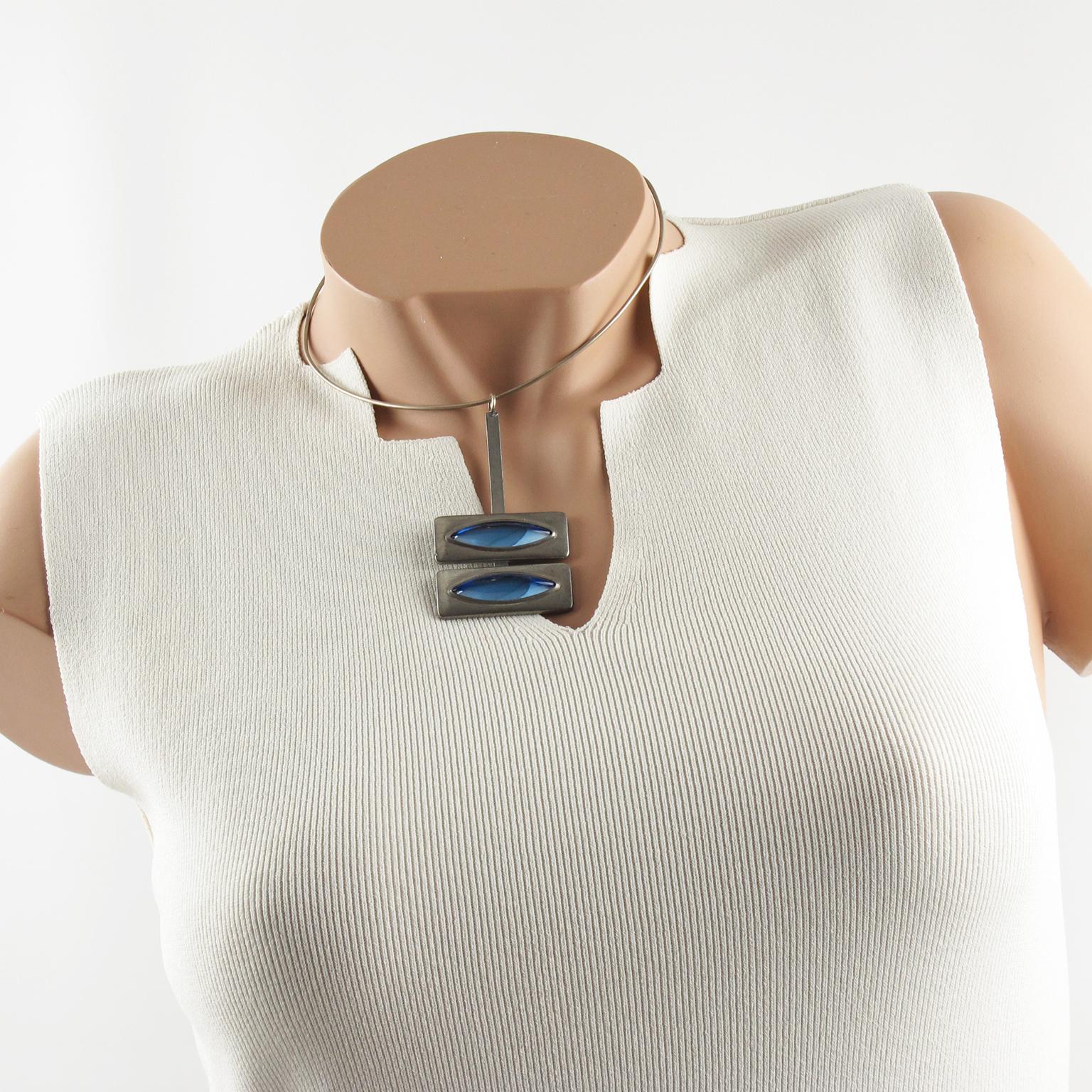 Danish jewelry artist Jorgen Jensen designed this elegant Space Age modernist collar pendant-necklace. The piece is all made in pewter with arctic blue poured glass cabochons. The artist's signature is at the back and reads Pewter - Jorgen Jensen -