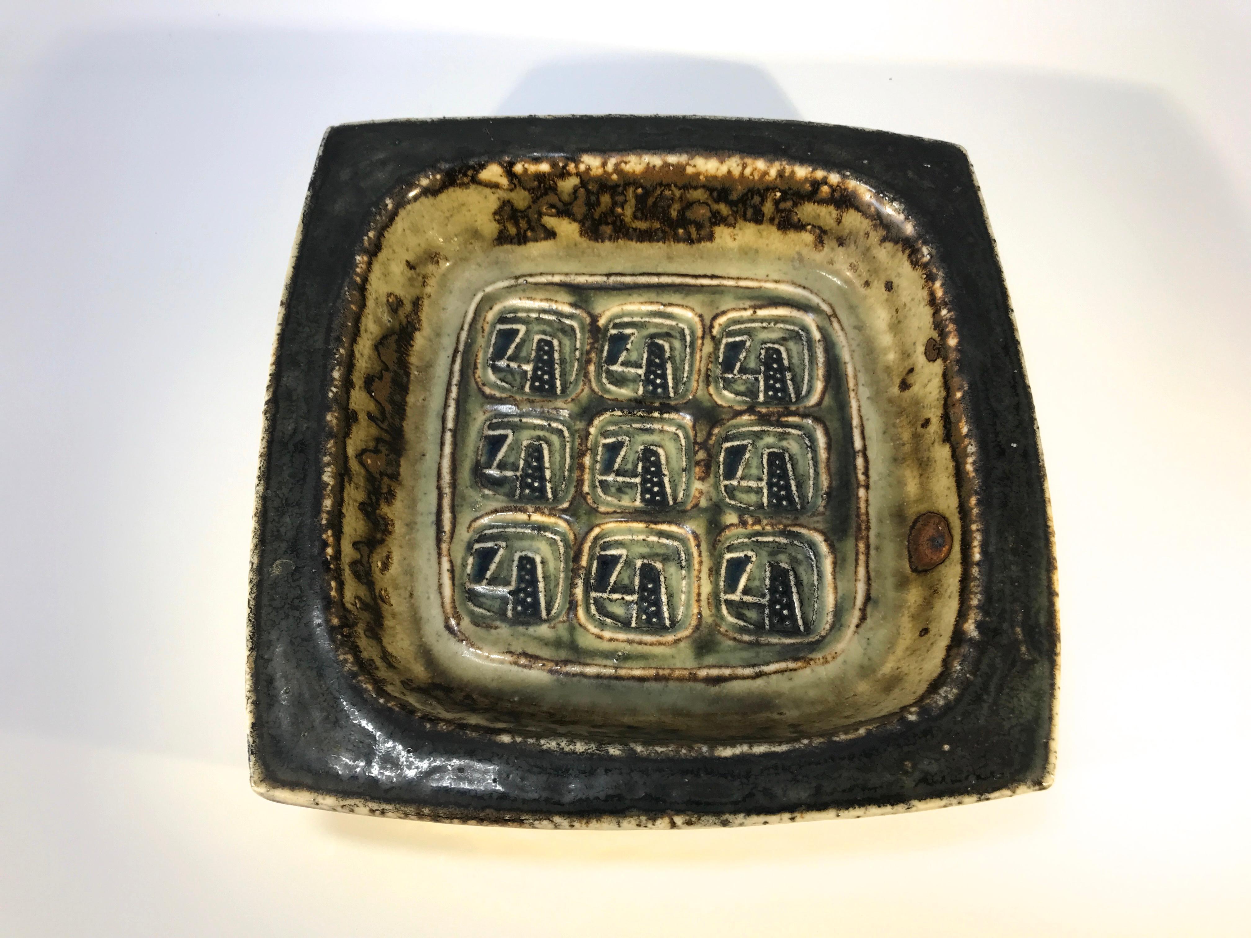 Square Abstract dish by Jorgen Mogensen for Royal Copenhagen, circa 1969
Dark brown glaze with hints of dark blue in the design
Signed and numbered 21972
In excellent condition and a worthy collectors piece.
  