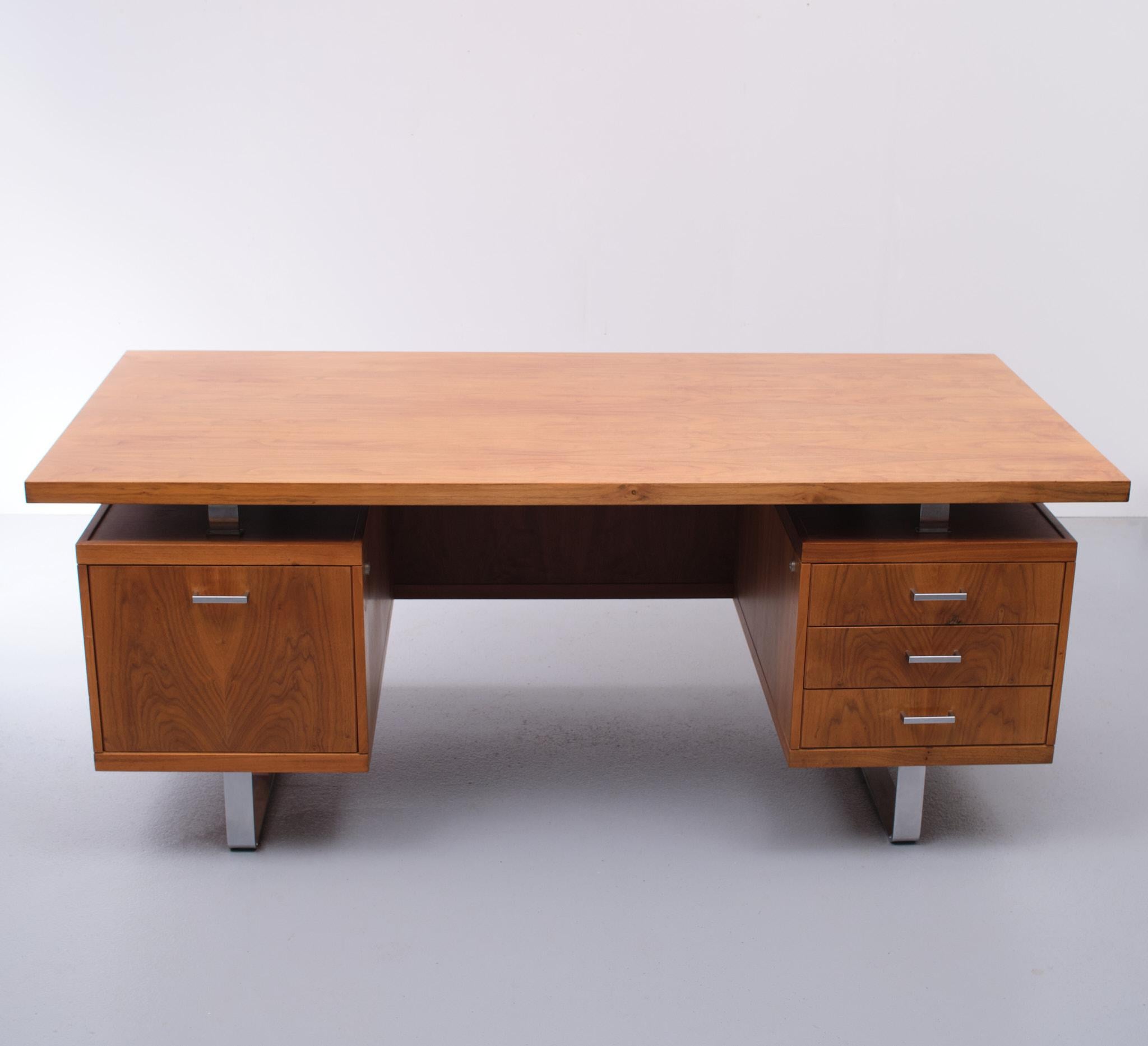 Beautiful executive office. Teak wood. Design Jórgen Pedersen for E Pedersen & Son a/s Denmark 1960s
Chrome handles and legs. Heavy and large desk. Very nice grain in the teak.
 