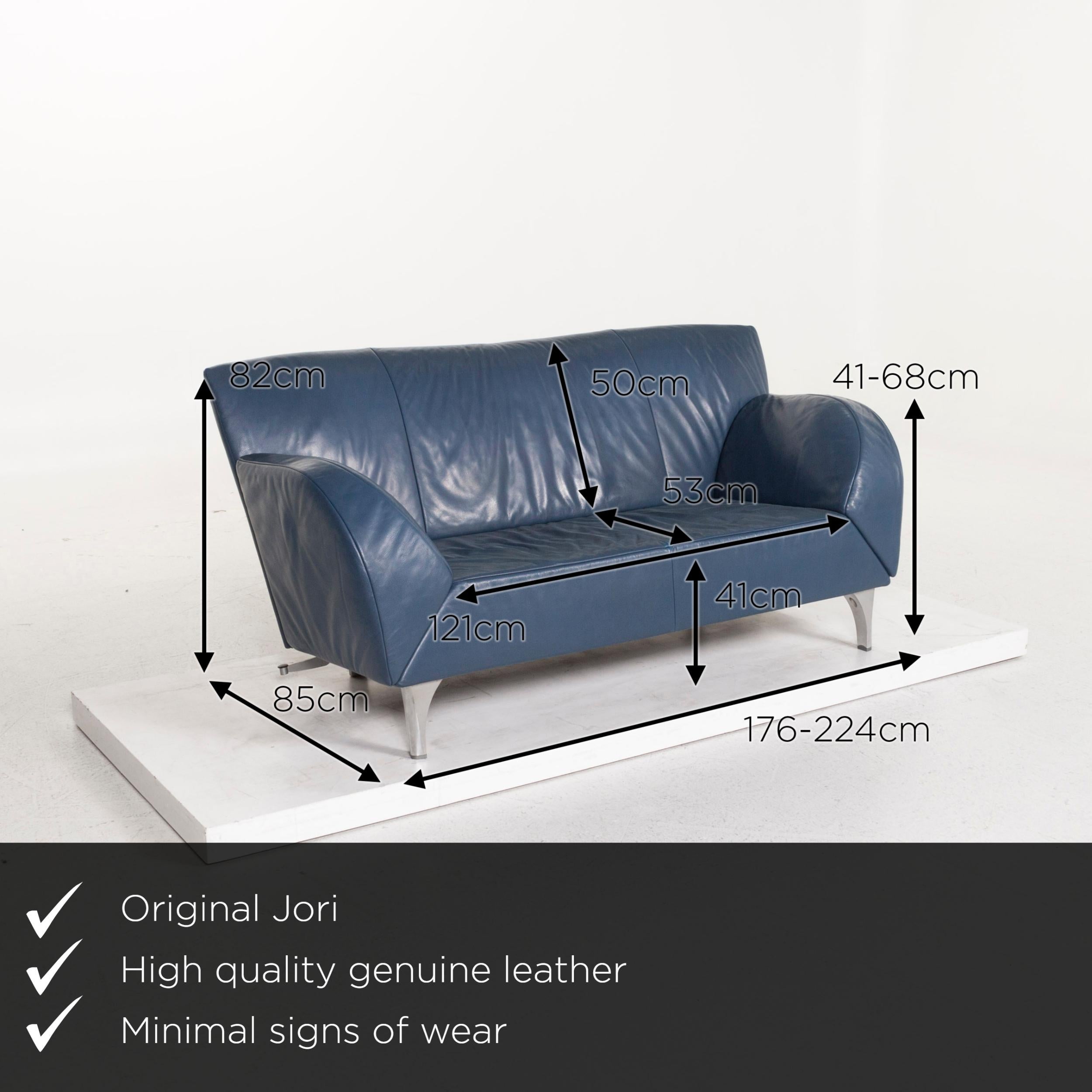 We present to you a Jori leather sofa blue function two-seat couch.
 

 Product measurements in centimeters:
 

Depth 85
Width 176
Height 82
Seat height 41
Rest height 41
Seat depth 53
Seat width 121
Back height 50.

 