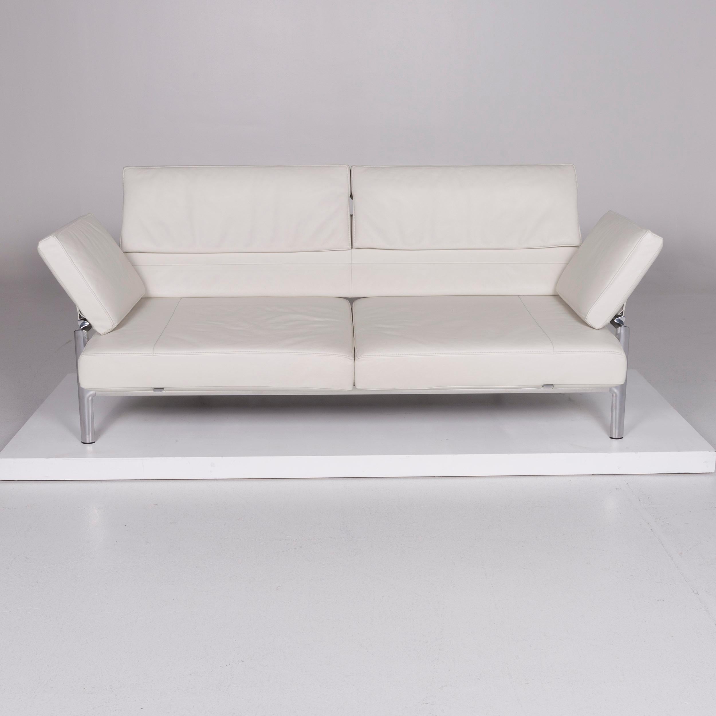 We bring to you a JORI leather sofa white two-seat.

 Product measurements in centimeters:
 
Depth 88
Width 208
Height 84
Seat-height 41
Rest-height 55
Seat-depth 57
Seat-width 162
Back-height 42.
            