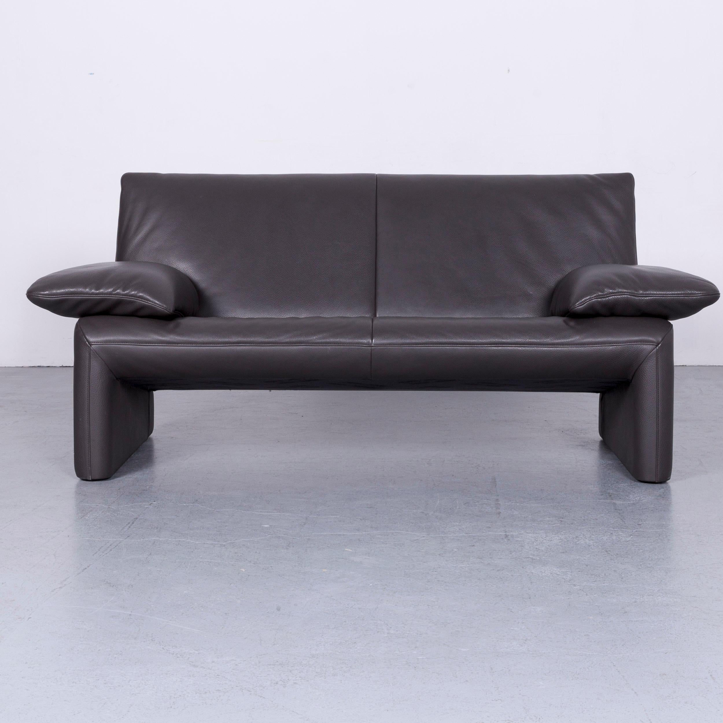 We bring to you an Jori linea designer leather sofa foot-stool set grey two-seat couch.