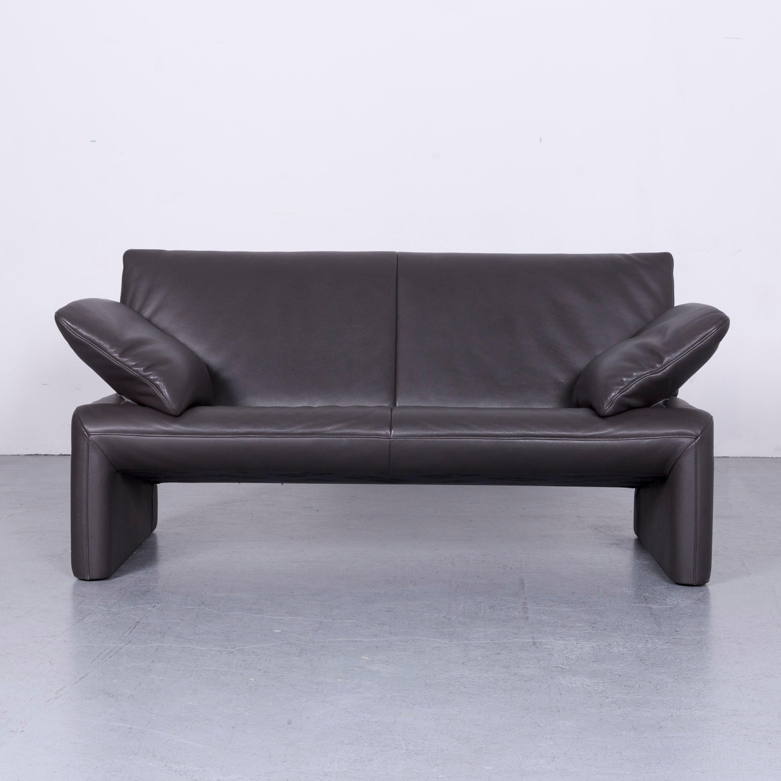 We bring to you an Jori linea designer leather sofa grey two-seat couch.