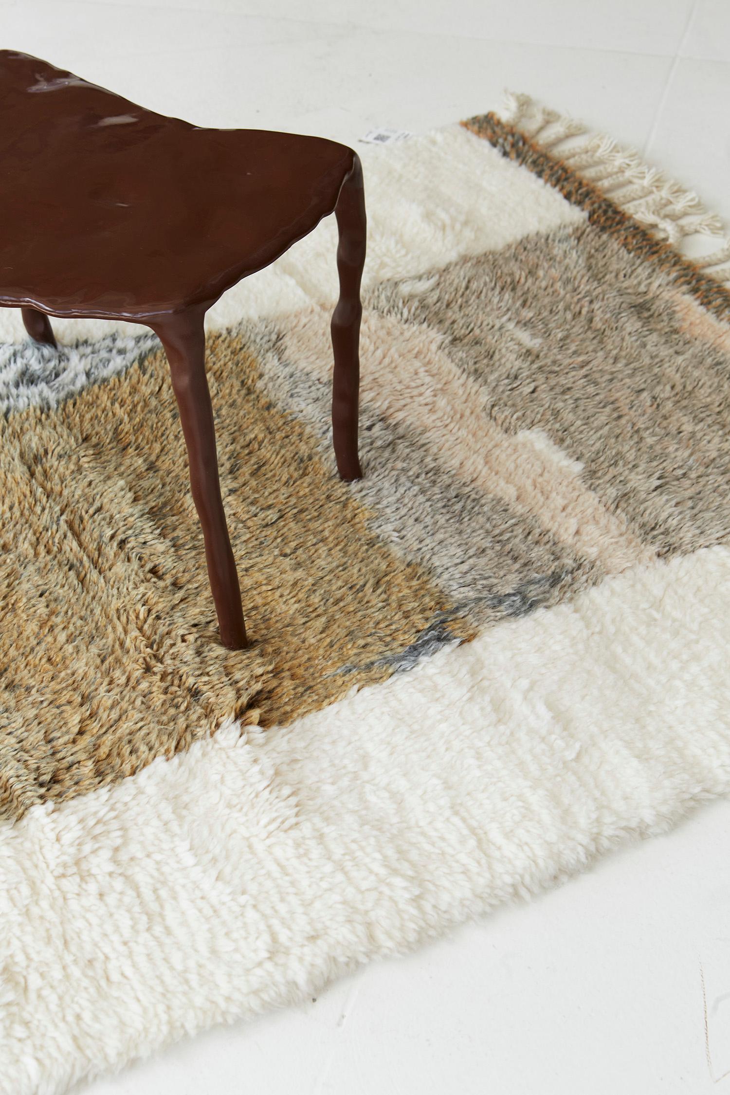 Jorja is a breathtaking rug inspired by the Atlas Mountains of Morocco. This magnificent rug features earth-toned colors and irregular shapes and design elements that work cohesively to make for a great contemporary interpretation for the modern