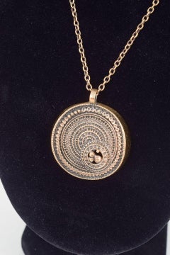 Jorma Laine, Finland. Bronze medallion with ornamental relief design. 1970s