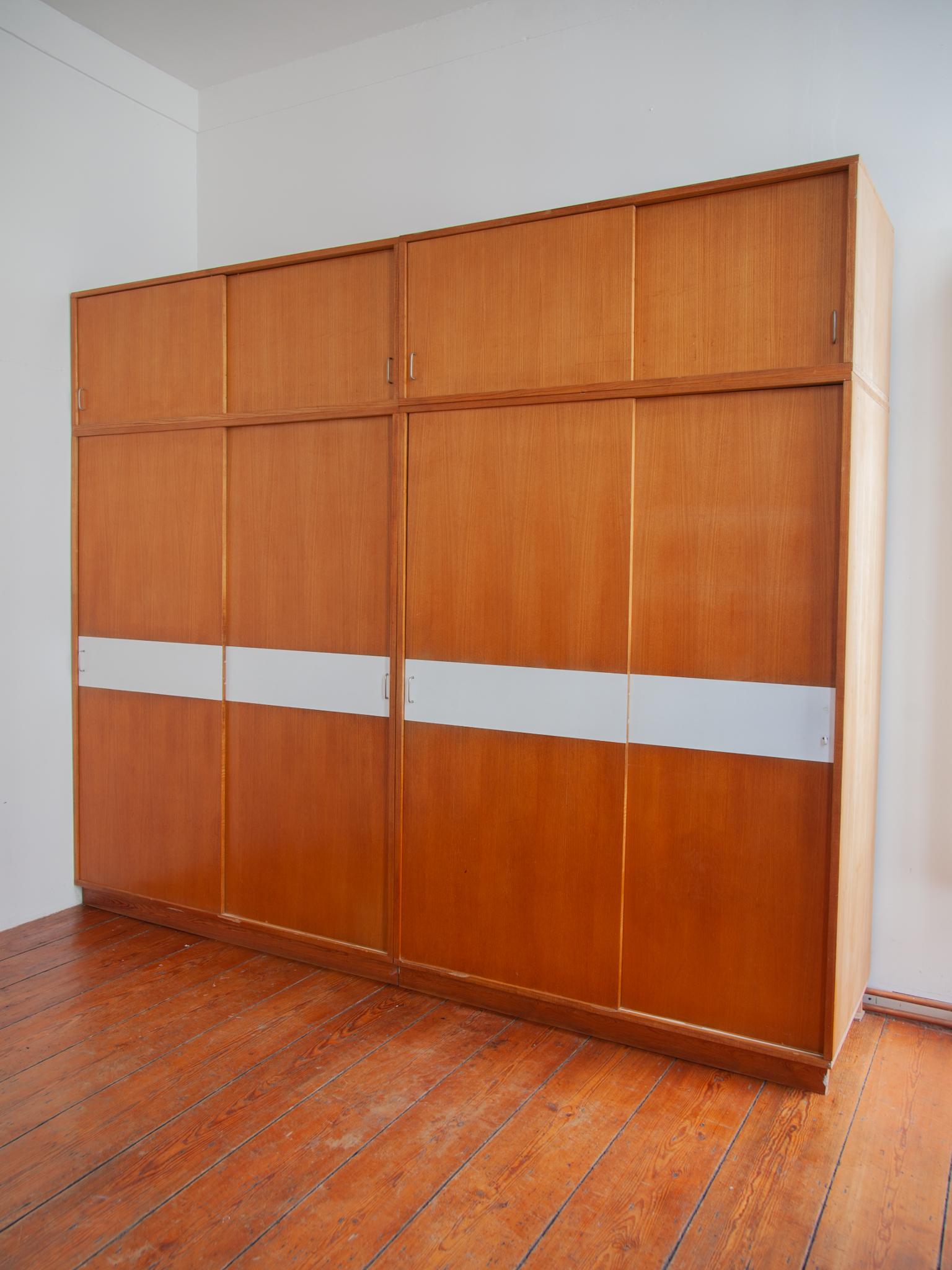 Very rare large wardrobe commissioned for a luxury apartment designed in 1960 by Jos De Mey one of the after the war Belgium Modern designers in the 50s and 60s.A beautiful loft ,sleeping-room or office wardrobe from cherrywood manufactured by Van