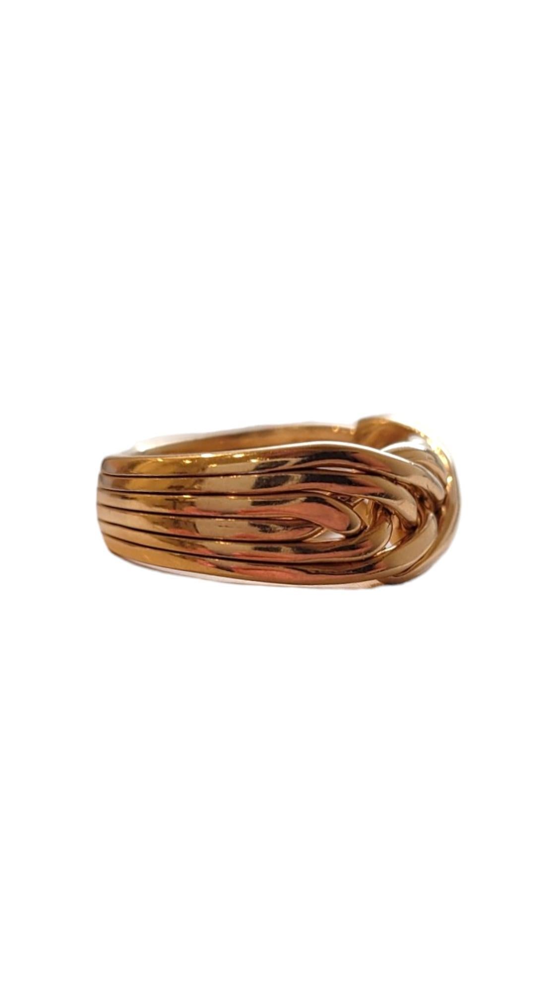 14K Yellow Gold Puzzle Ring 

Imagine wearing a miniature riddle on your finger—a 14K yellow gold puzzle ring. With its interlocking bands, this ring is like a tiny, elegant labyrinth for your finger.

Hallmark: Jose 14KT

Weight: 7.1 g/ 4.6
