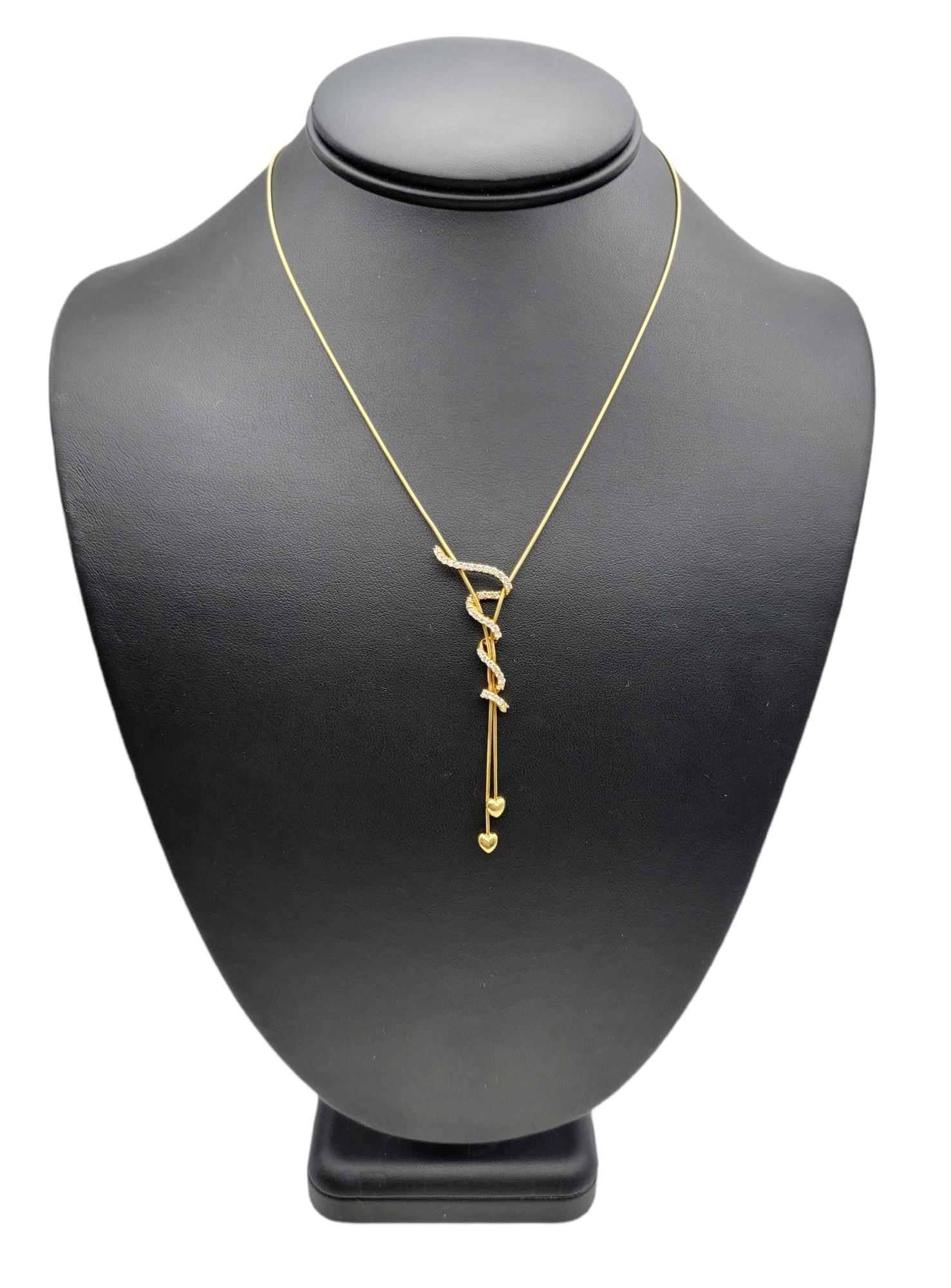 Jose Hess 18 Karat Yellow Gold Drop Necklace with Hearts and Diamond Squiggle For Sale 3