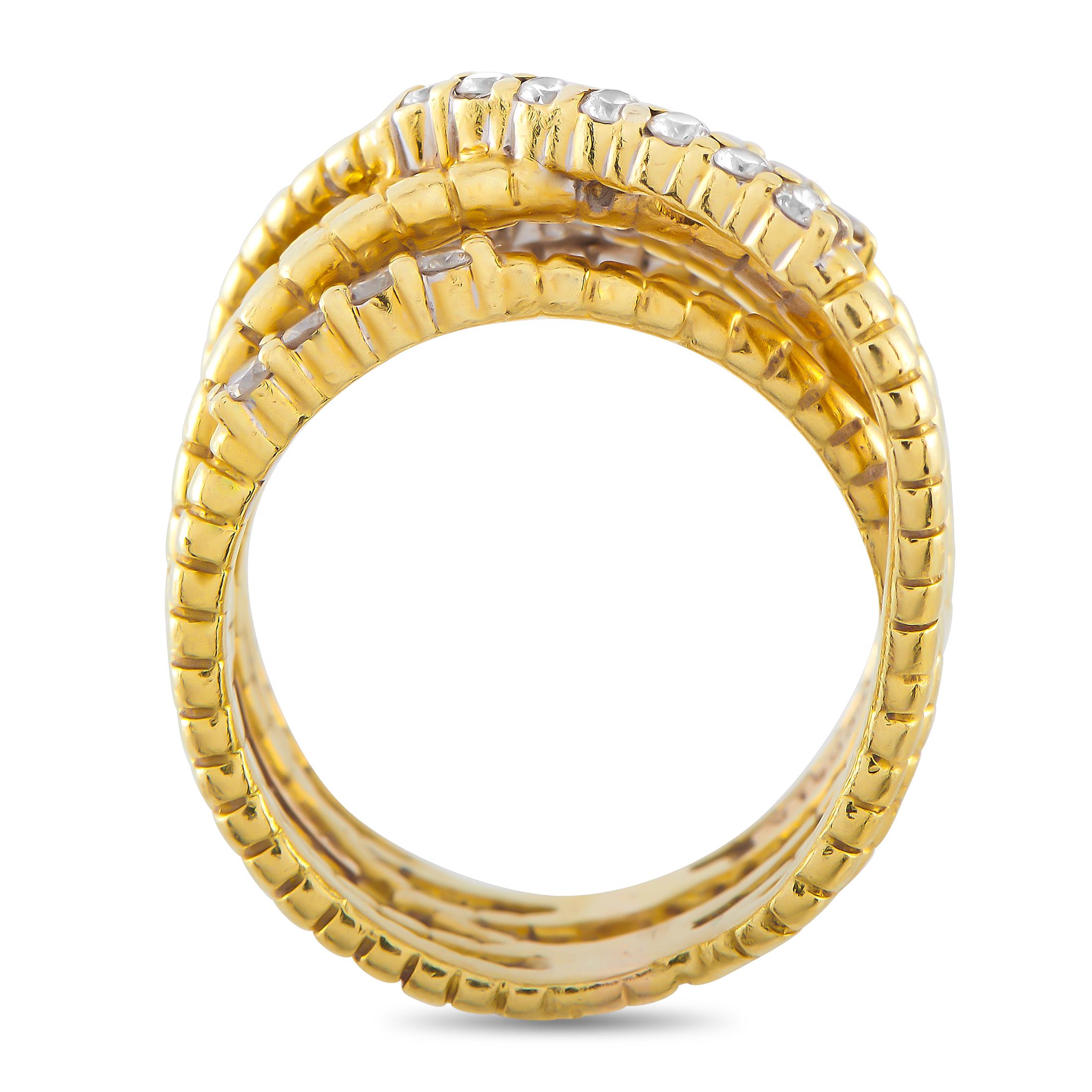 Textured 18K Yellow Gold bands beautifully intertwine on this Jose Hess ring. Elevated by Diamonds with a total weight of 0.60 carats, this exquisite accessory will add texture, dimension, and sparkle to any ensemble. It features a 12mm wide band