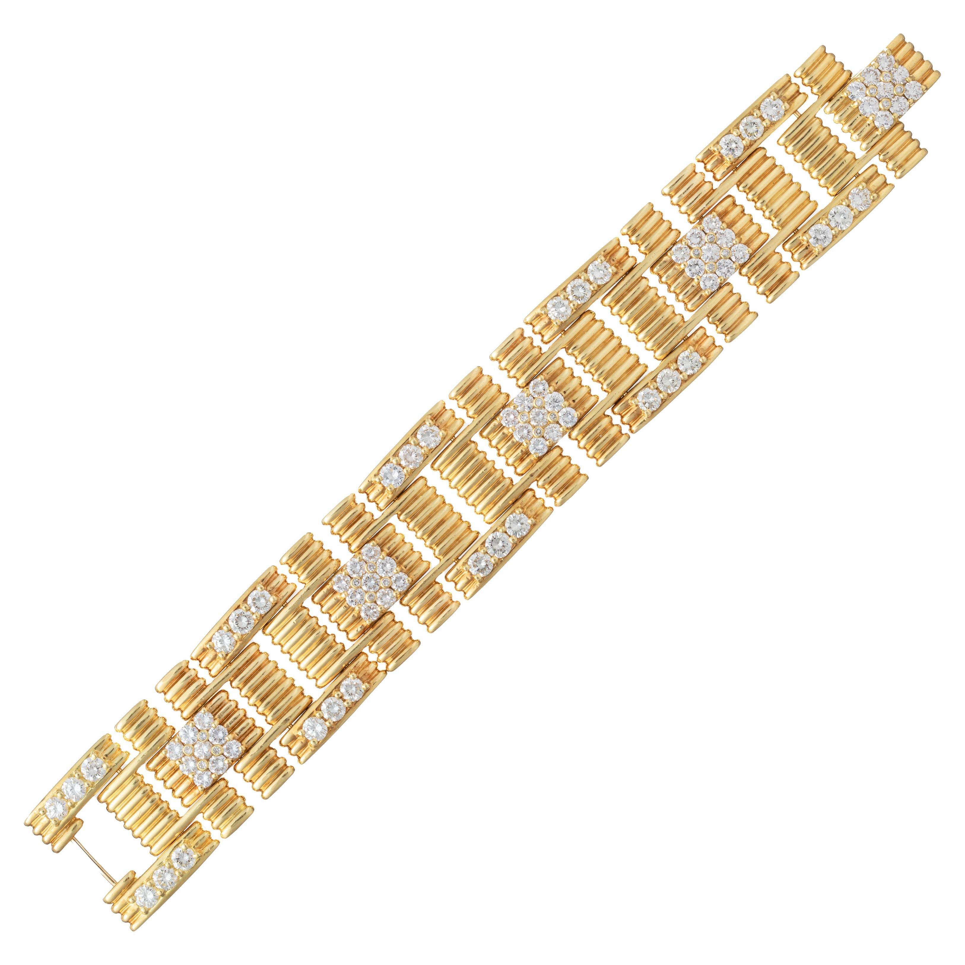 Jose Hess vintage link bracelet, featuring ridged square and rectangular-shaped links in 18k yellow gold accented by near-colorless round-cut diamonds. Diamonds weighing approximately 9.58 total carats (G-I color, VS2-SI1 clarity). Signed 'JOSE
