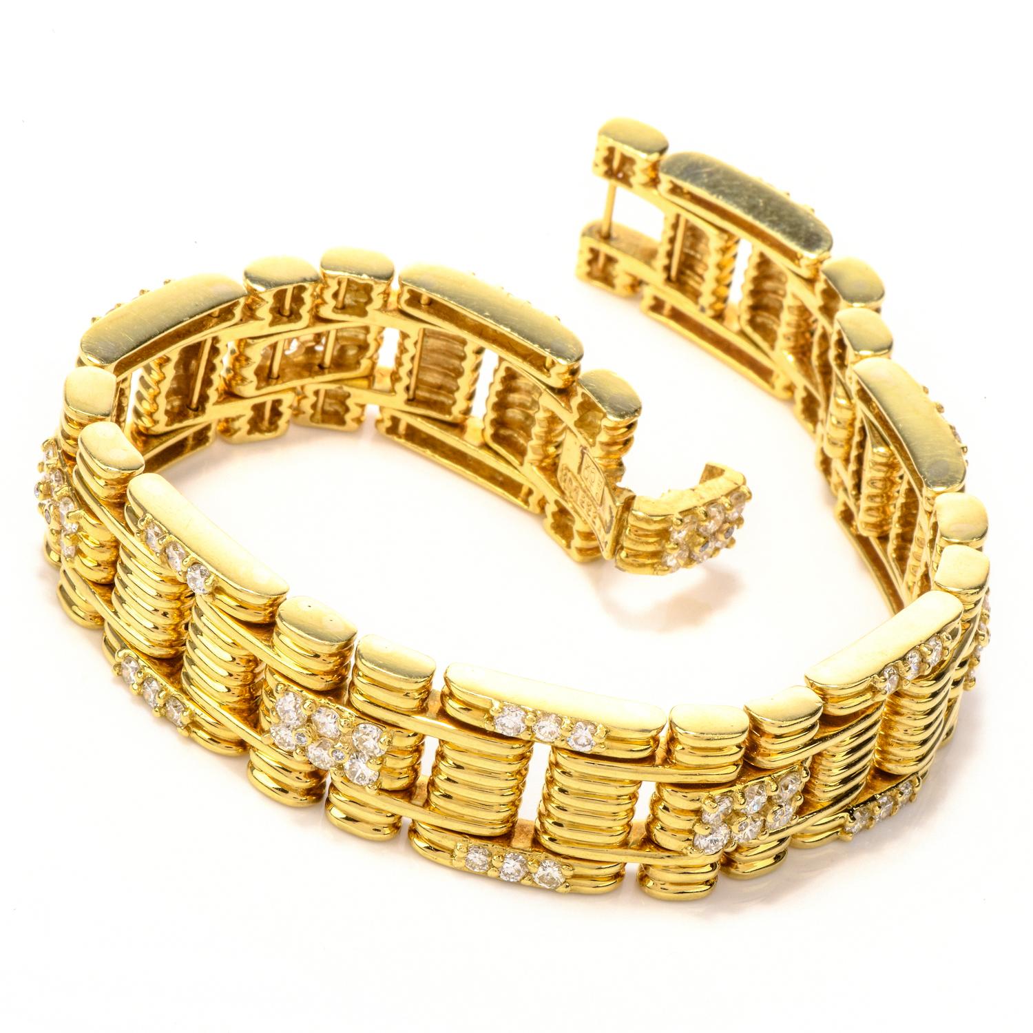 A Glimpse at Sleek Design!
Crafted in 70.4 grams of luxurious 18K yellow gold, this 1980's Jose Hess masterpiece bracelet features an alternating diamond embellished ribbed link sequence. 

It set with 78 fine quality natural round diamond weighing