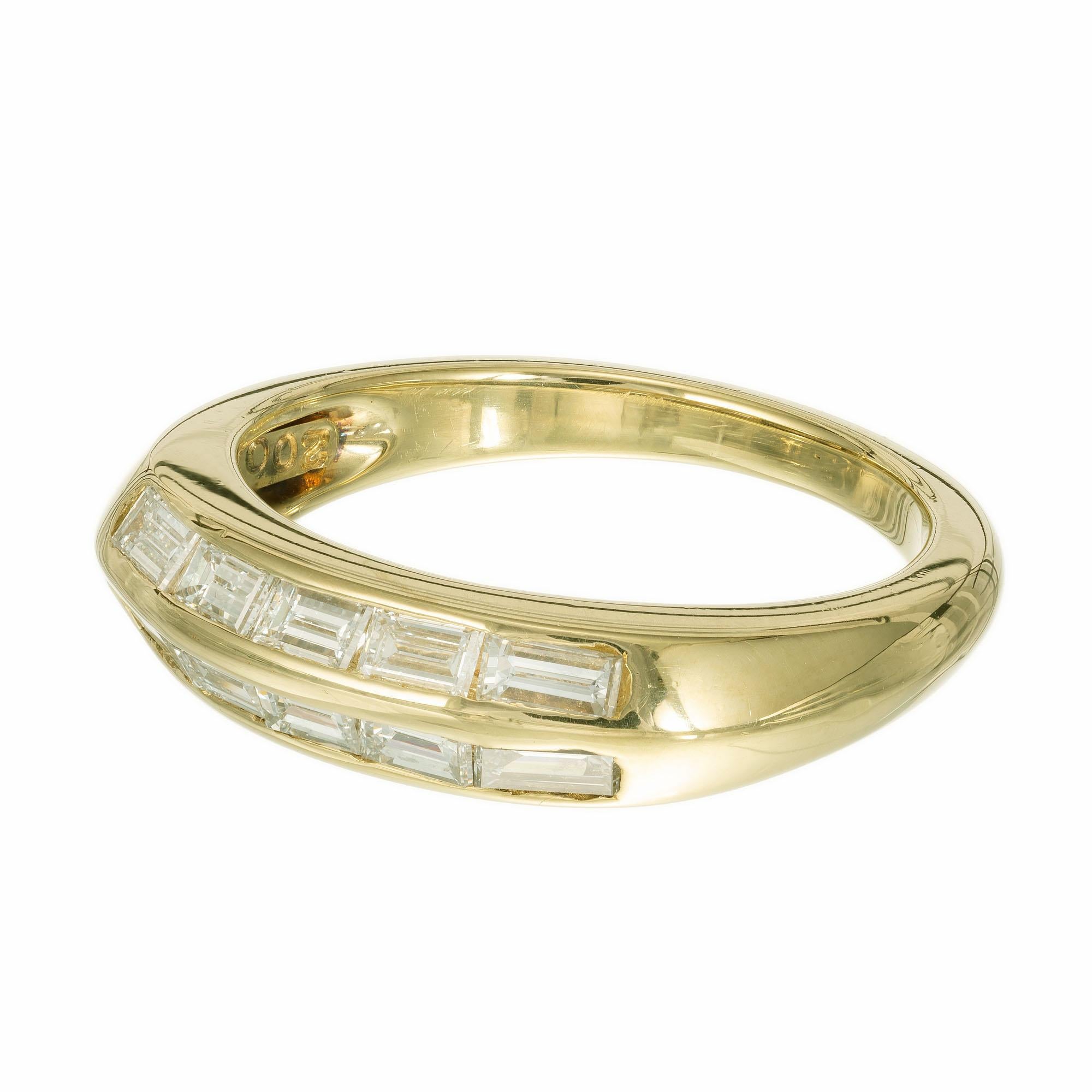 Jose Hess baguette diamond two row wedding band ring in an 18k yellow.  

10 baguette diamonds G VS, approx. .75cts
18k yellow gold 
Ring Size: 7 and sizeable 
Stamped: 18k
Hallmark: JoseHess #2001259A
4.9 grams
Width at top: 5.2mm
Height at top: