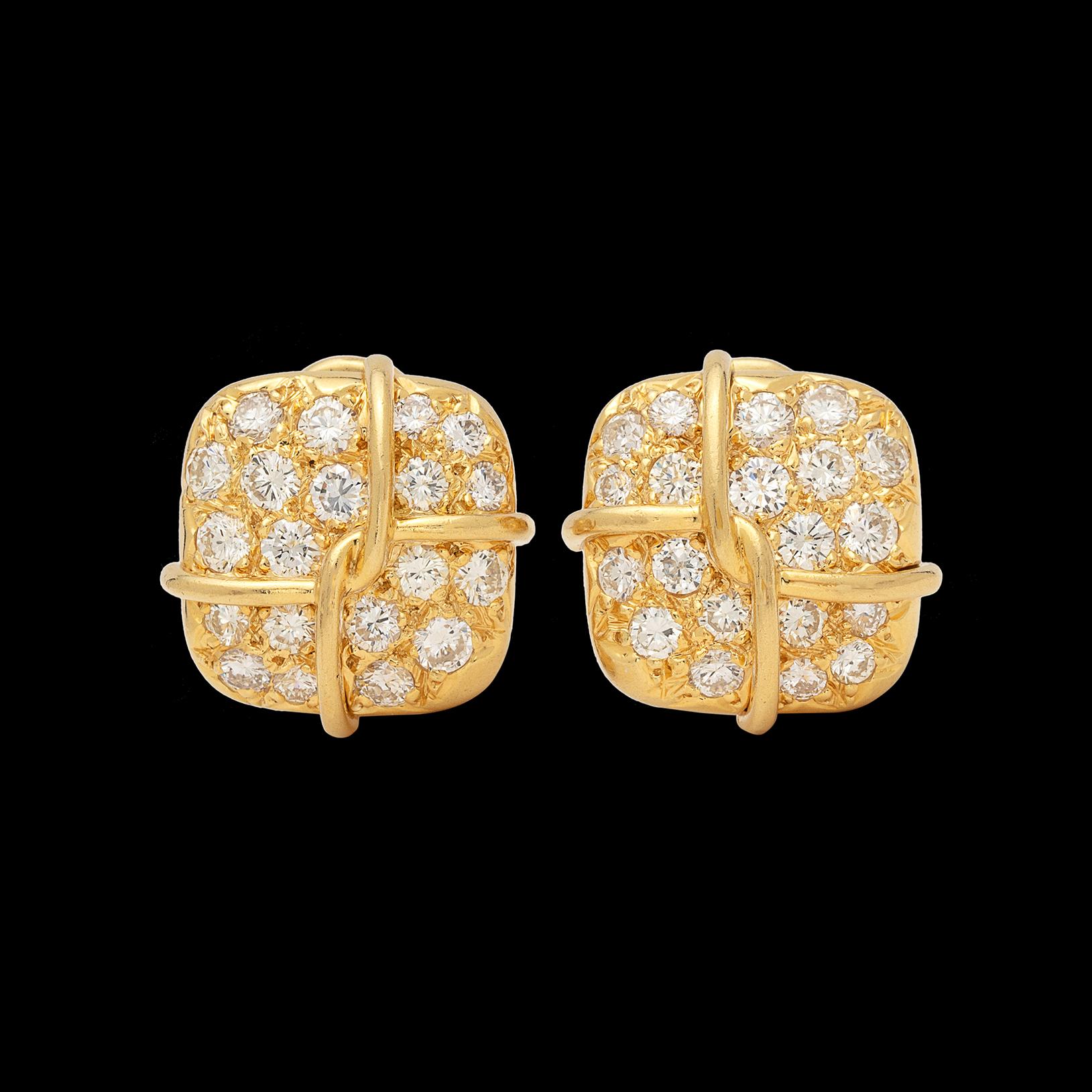 Cushion-shaped and sparkling, these Jose Hess diamond-set earrings are 1980's at their best. Pave-set with 40 round brilliant-cut diamonds totaling approximately 2.00 carats, the earrings weigh 12.8 grams and measure 1/2in. Perfect for everyday