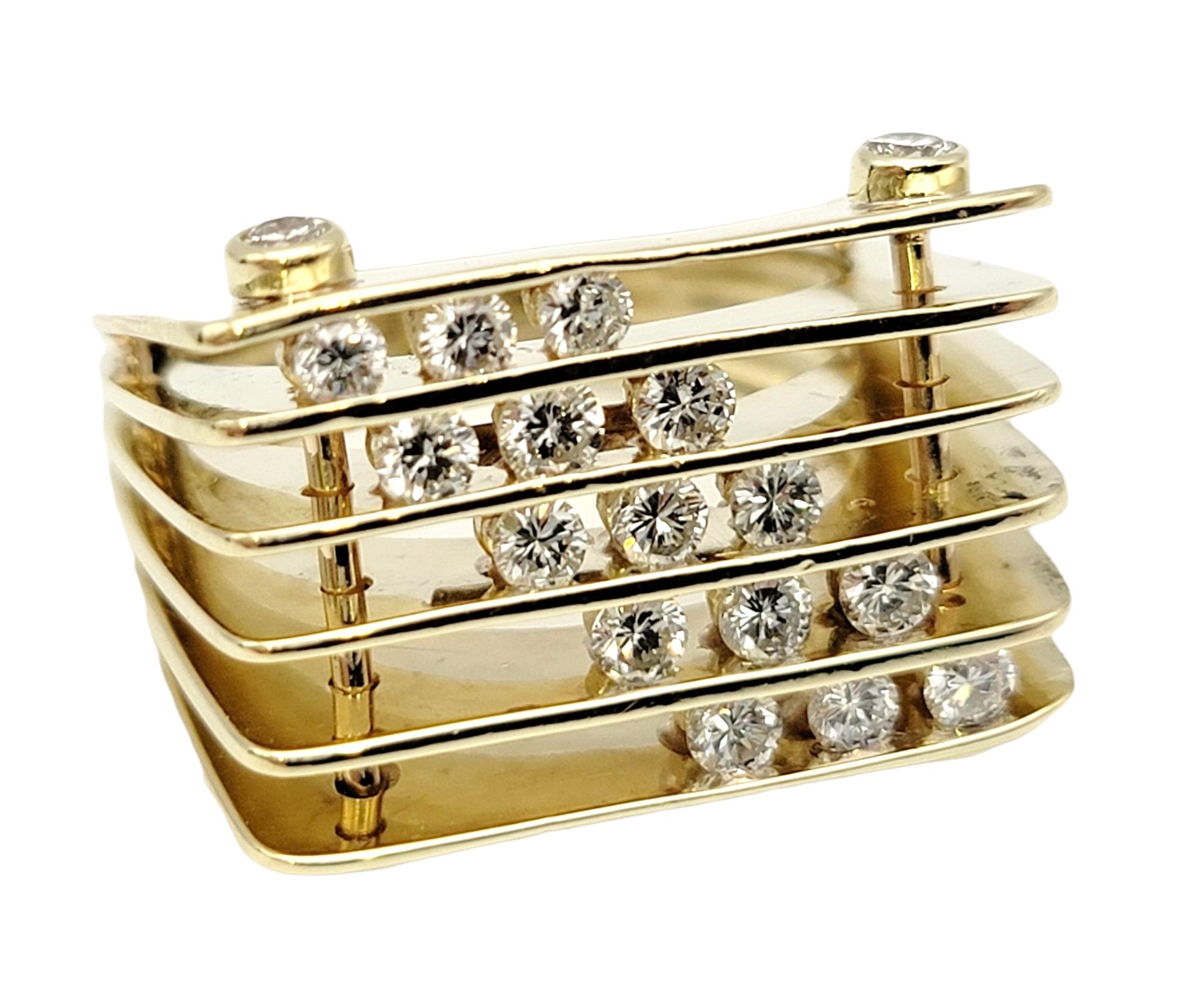 Ring size: 7.25

Ultra modern statement ring by designer, Jose Hess. The 'Modernist Musical' ring features a squared design with 5 ultra-thin layers of floating round diamonds, tension set in polished yellow gold. The natural diamonds are stacked in