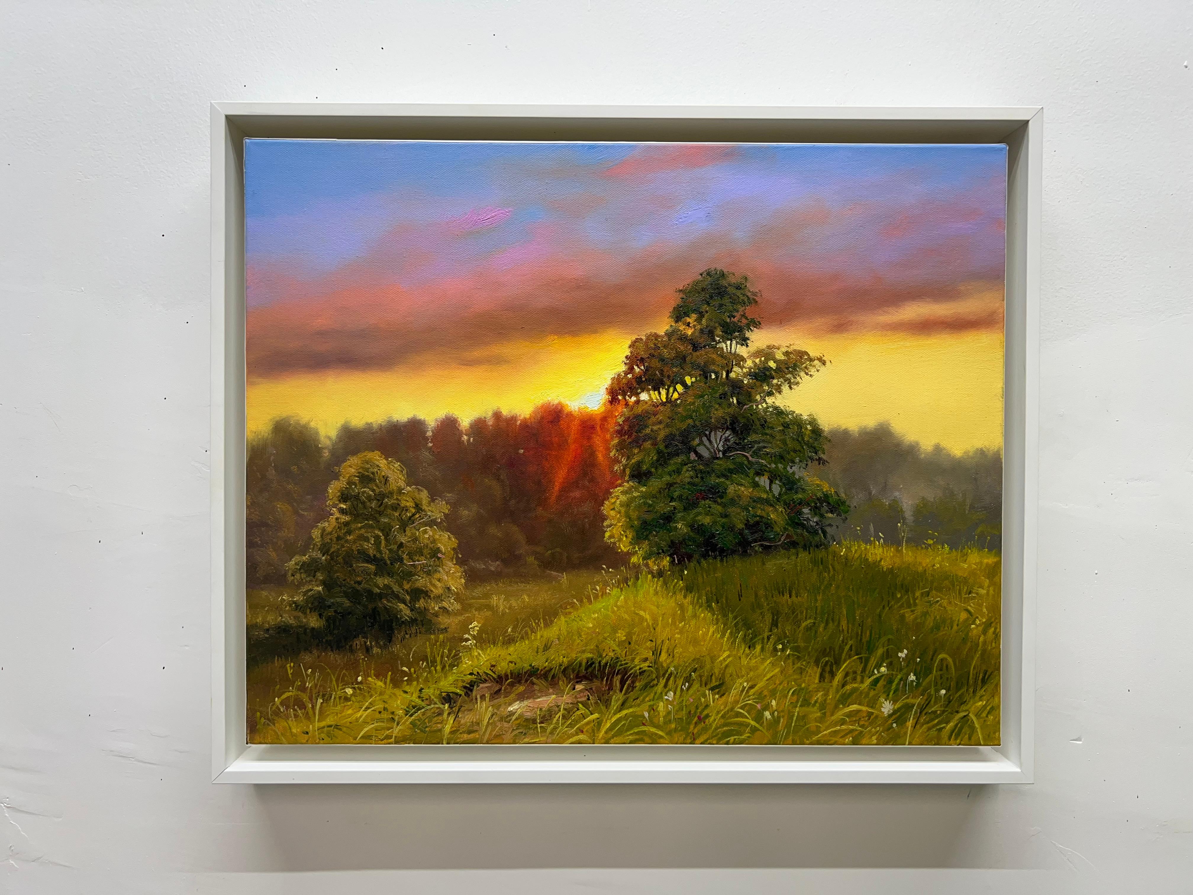 <p>Artist Comments<br>A magical sunset unfolds in artist Jose Luis Bermudez's realistic piece. The sky glows in gold and pink tones as the clouds slowly fade on the horizon. The setting sun leaves the landscape in a soft, warm light, saying goodbye