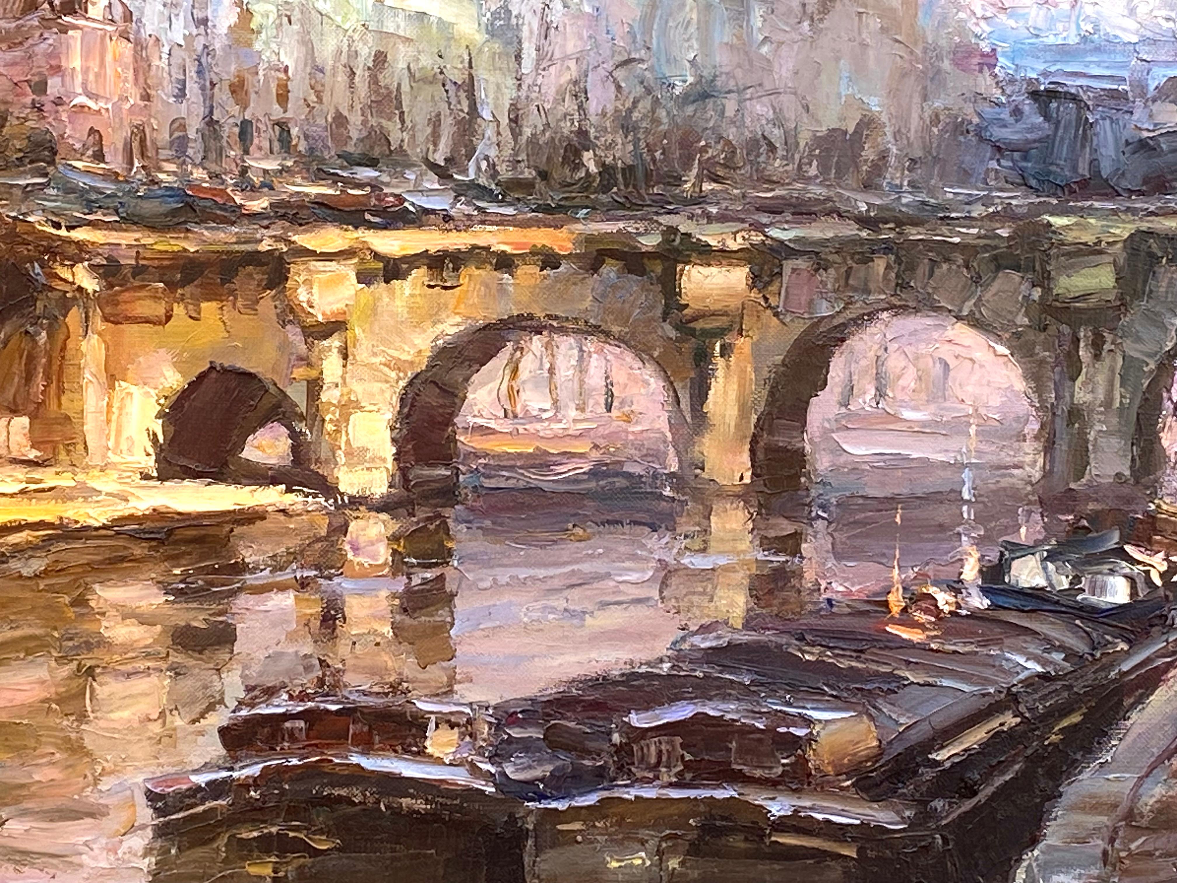 Ecco per te un dipinto di ottima fattura realizzato principalmente con la spatola dall'artista spagnolo Jose Luis Sanchez.  La scena è il ponte Pont Neuf di Parigi che attraversa la Senna. La guglia di Notre Dame è visibile sopra gli edifici in