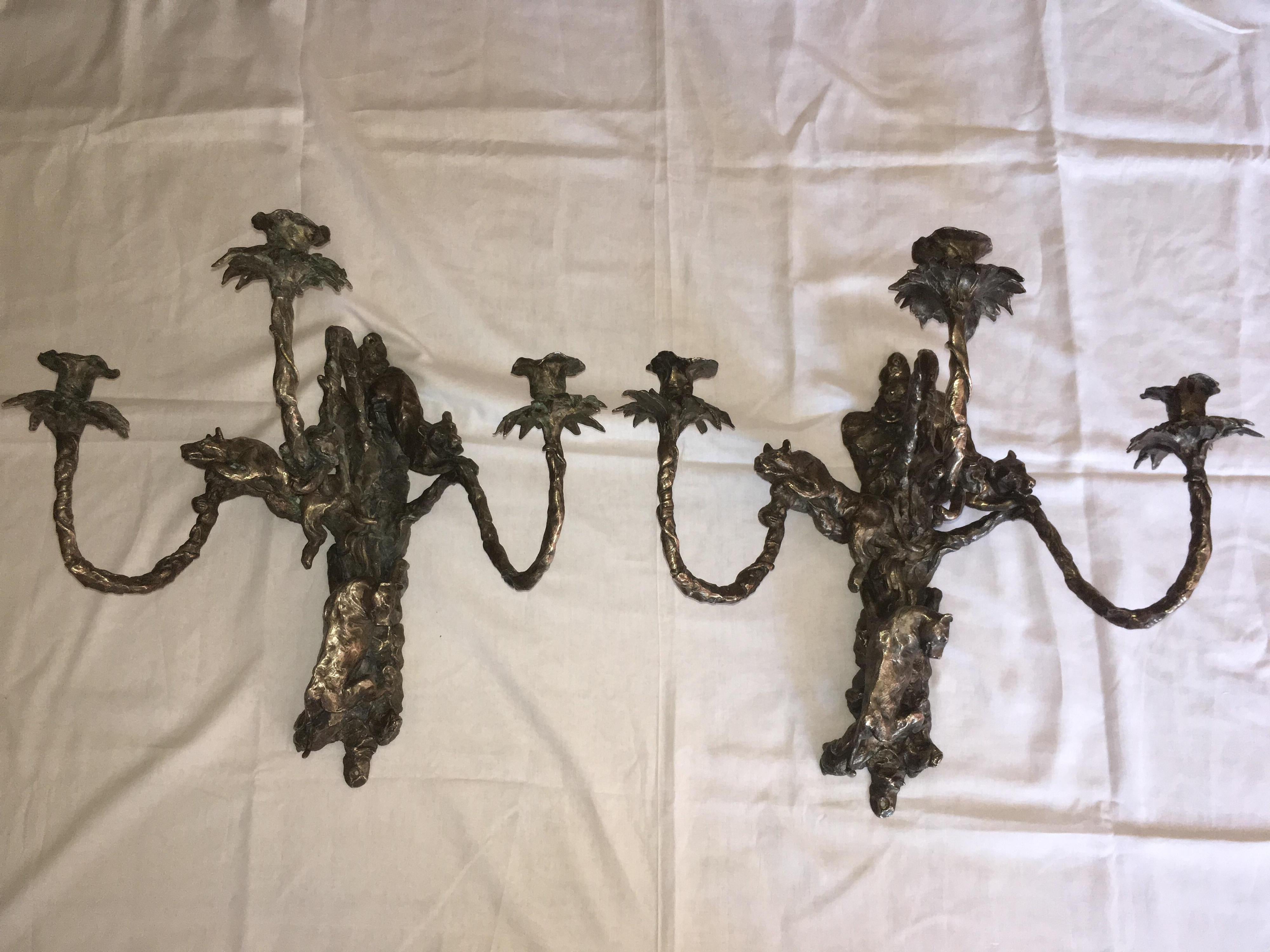 Unusual pair of silvered bronze wall candelabra designed by Jose Maria David in France in 2006.
This large model is very decorative. Panthers seem alive, hanging on branches or ready to jump
This rare wall candelabra with 3 arms and 3 panthers is