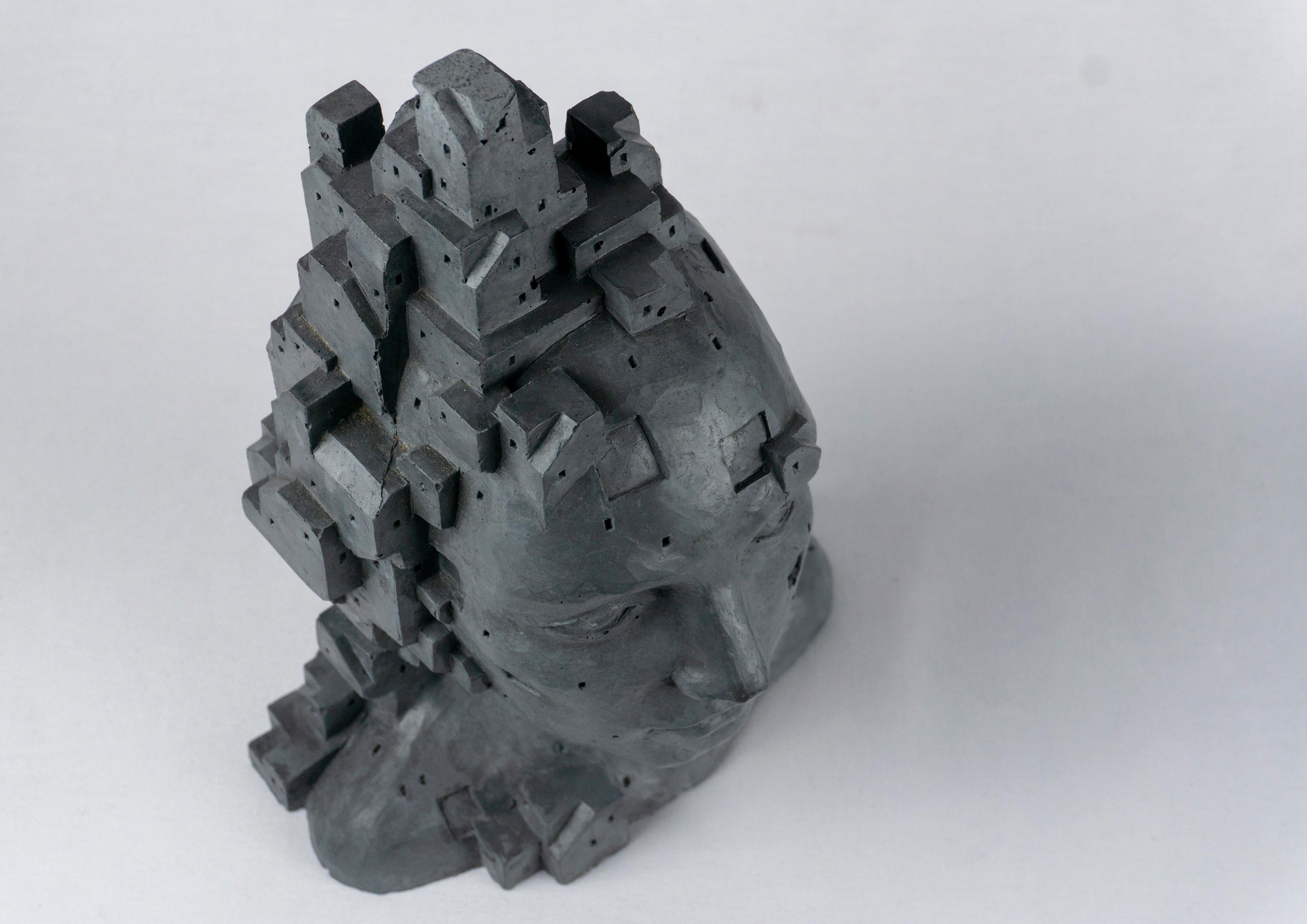 Scultura architettonica contemporanea Figura umana. Cemento grigio scuro. 