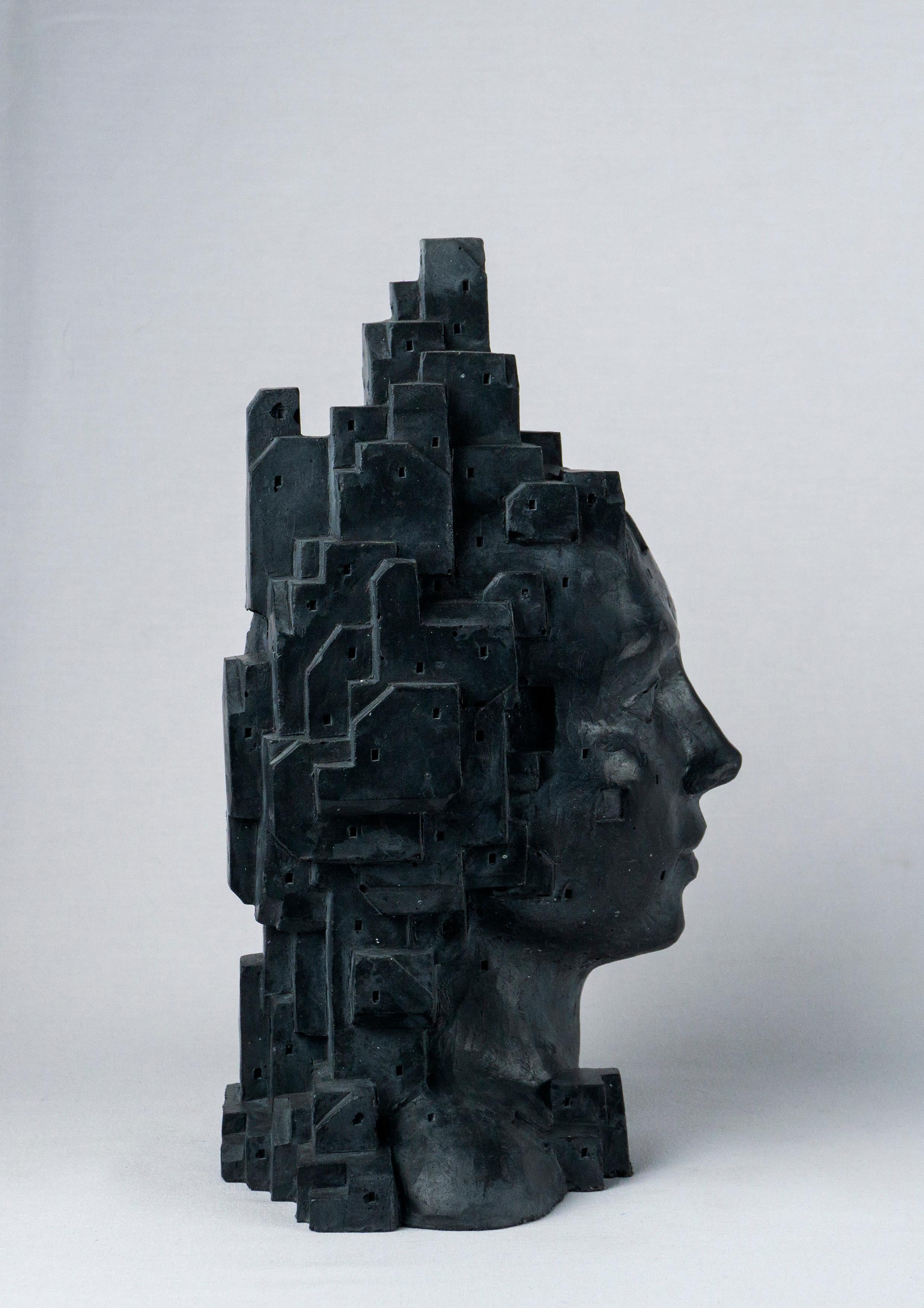 Busto figurativo architettonico ibrido in cemento nero. Antropotecnica 