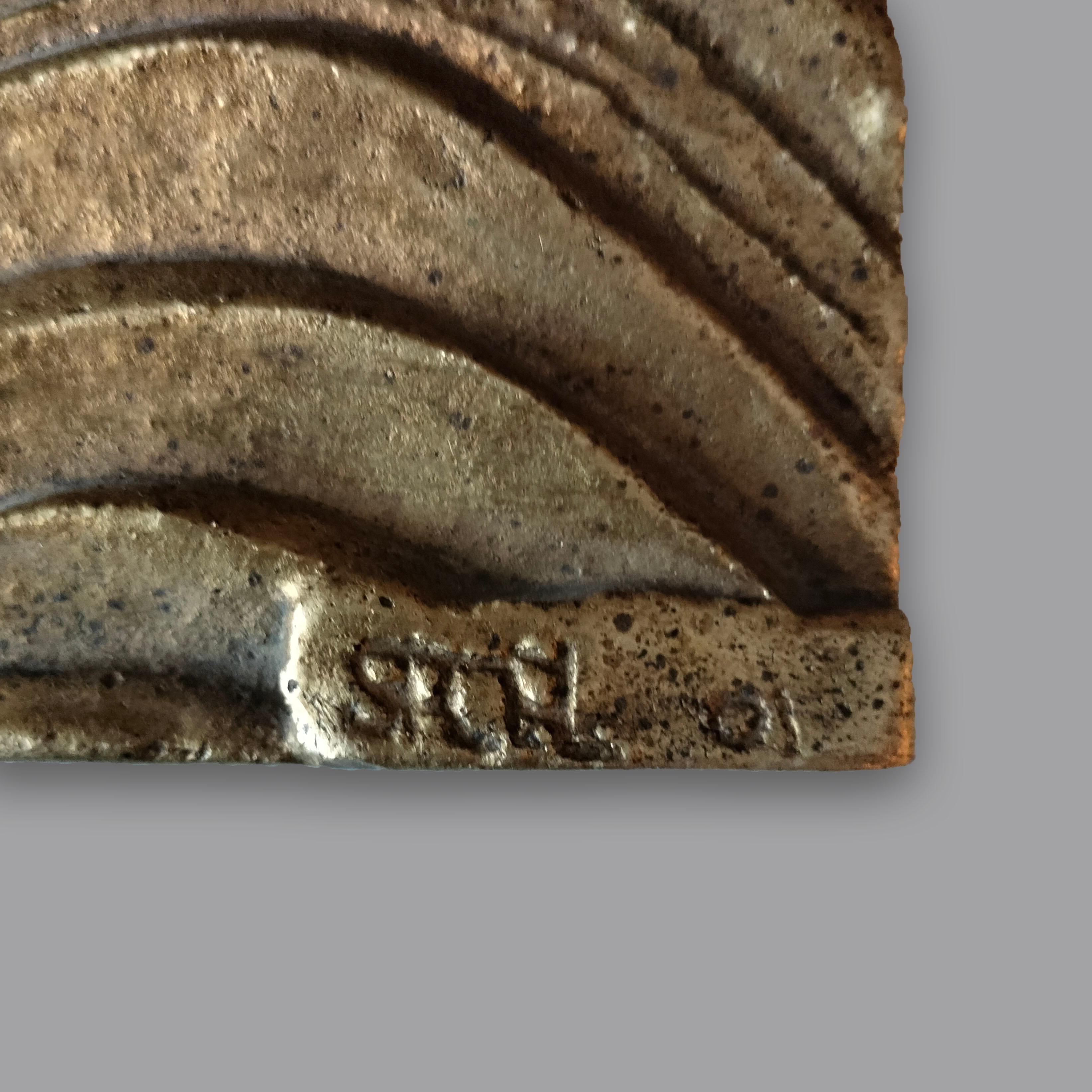 Eine Wandskulptur aus Bronzeguss des mexikanischen Künstlers José Sacal mit dem Namen 