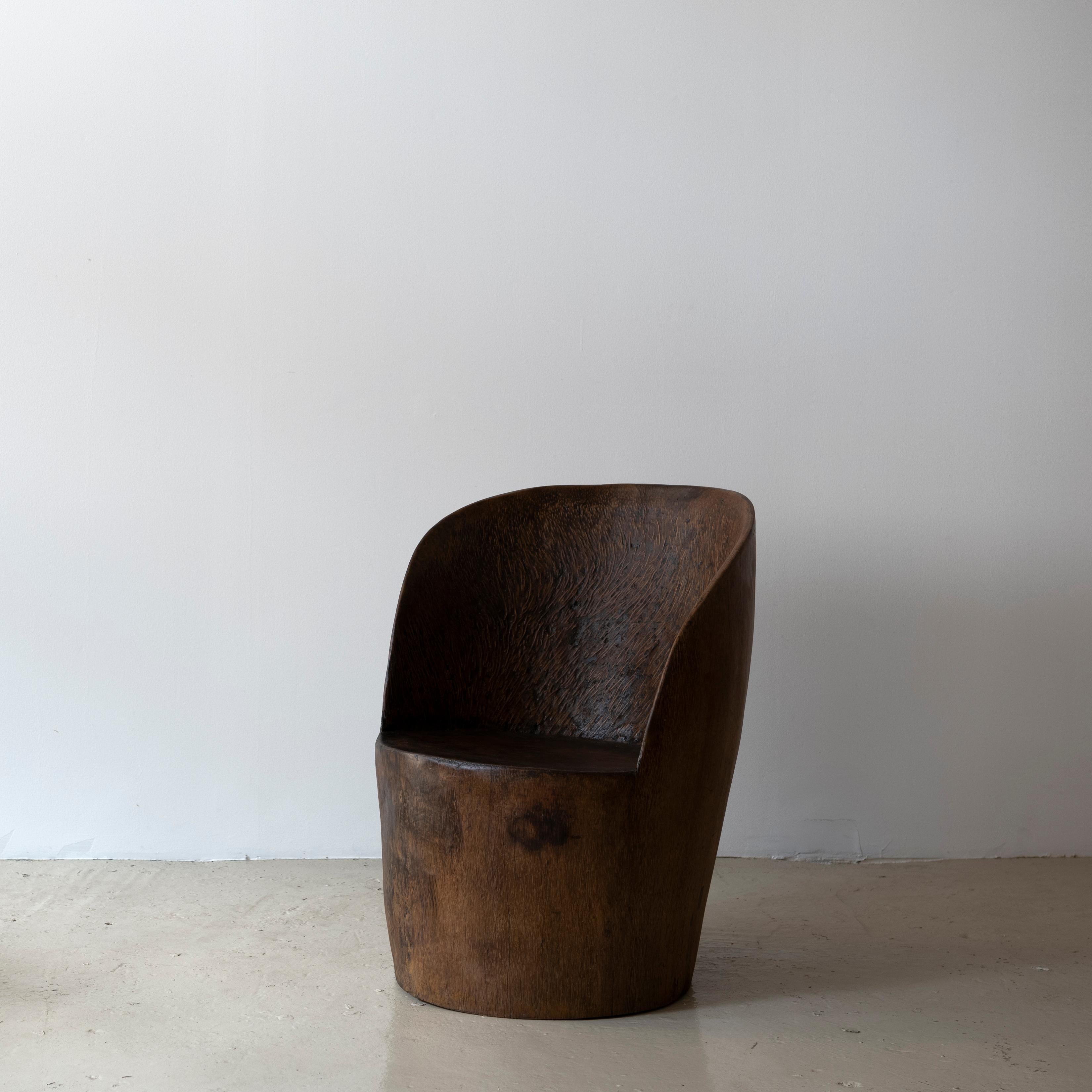 Hand-sculpted chair by José Zanine Caldas, Circa 1970s.

This chair was made of Brazilian hard wood. Signed 
